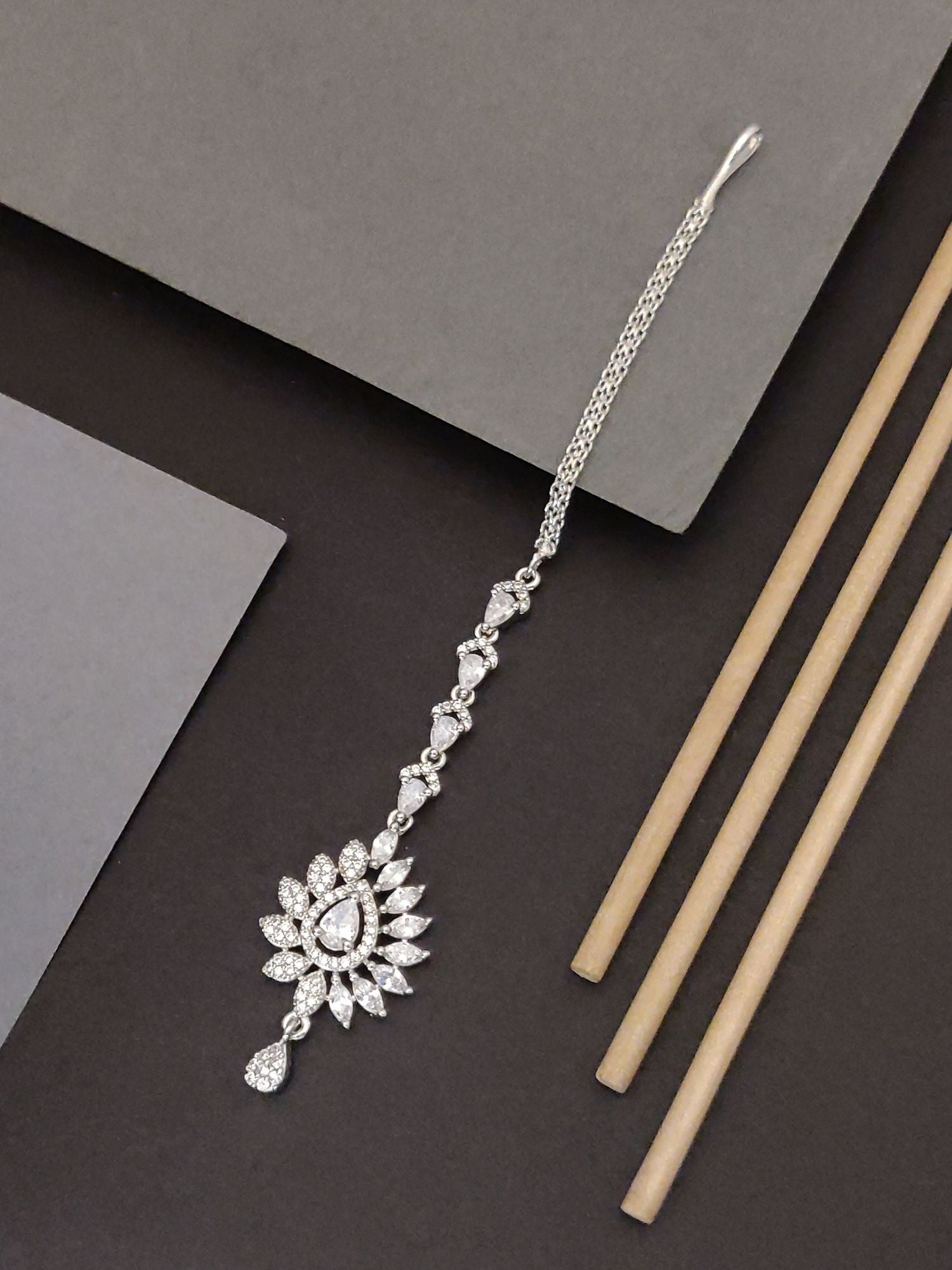 Silver Plated American Diamond Drop MaangTikka elegantly designed with intricate detailing