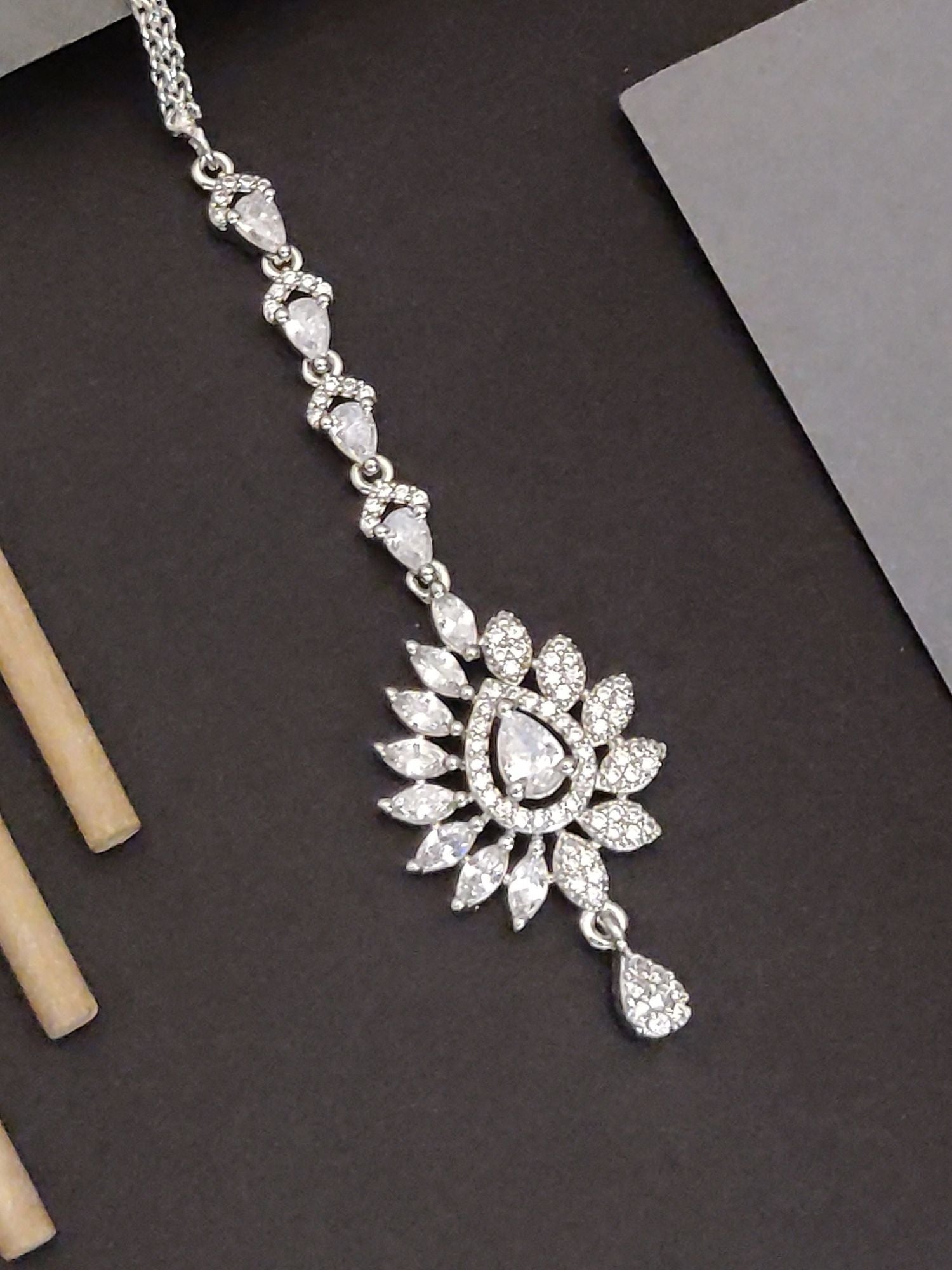 Elegant Silver Plated American Diamond Drop MaangTikka with floral design and intricate detailing