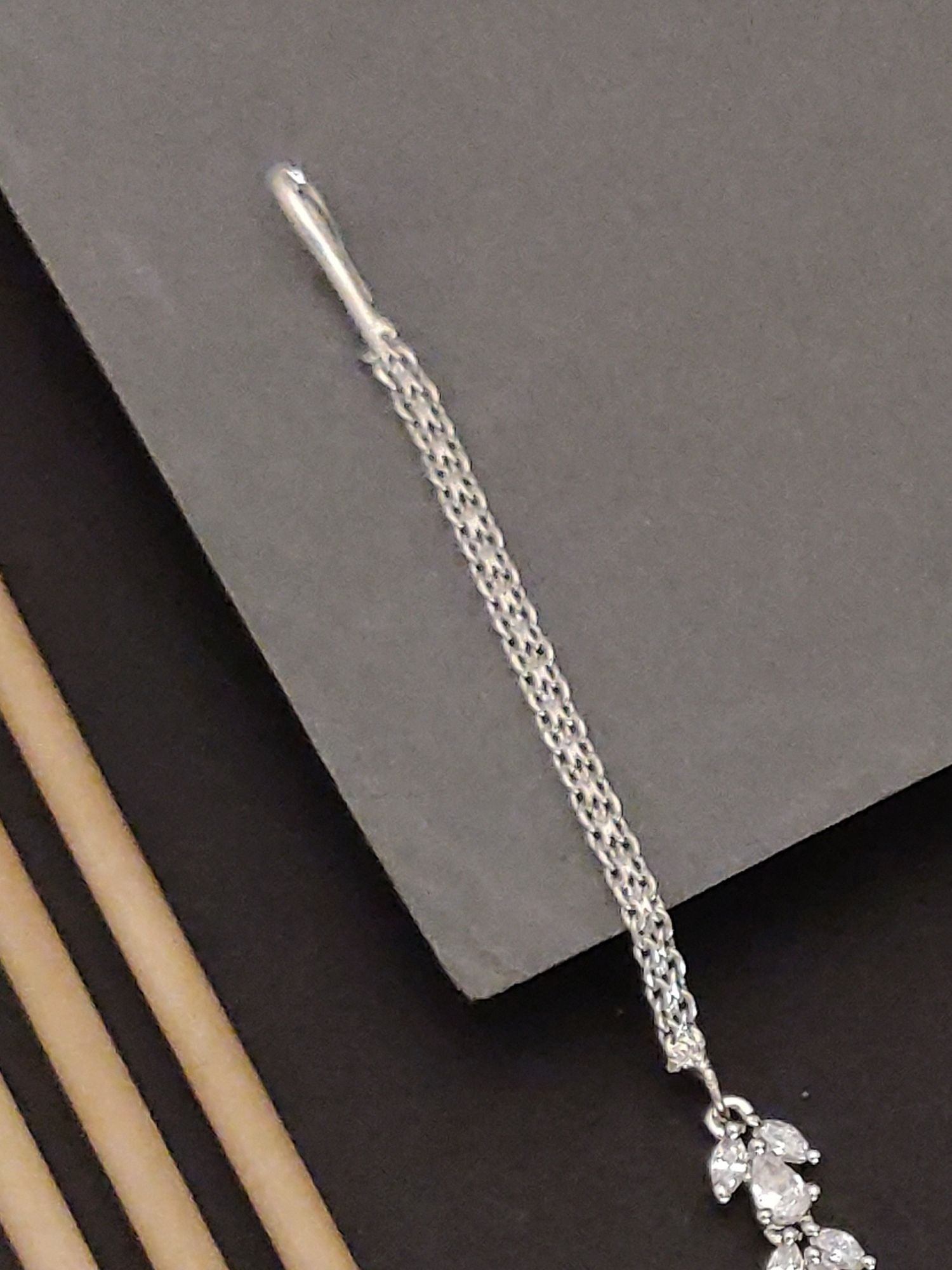 Elegant Silver Plated American Diamond MaangTikka design showcasing intricate detailing
