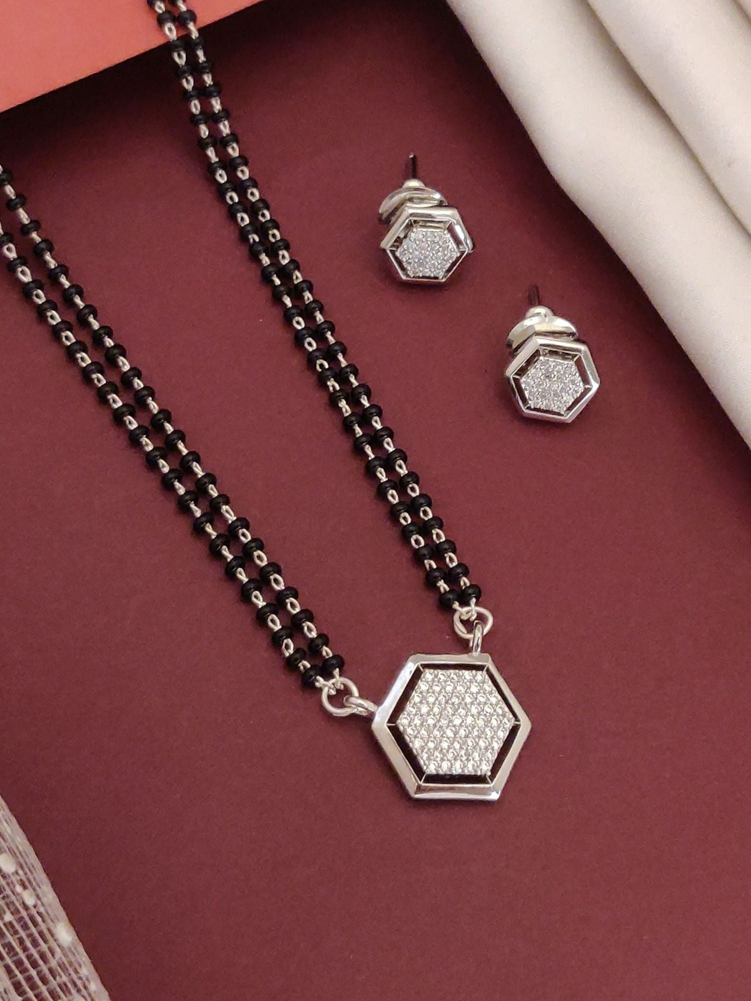 Silver Plated American Diamond Mangalsutra Set with hexagon pendant and matching earrings