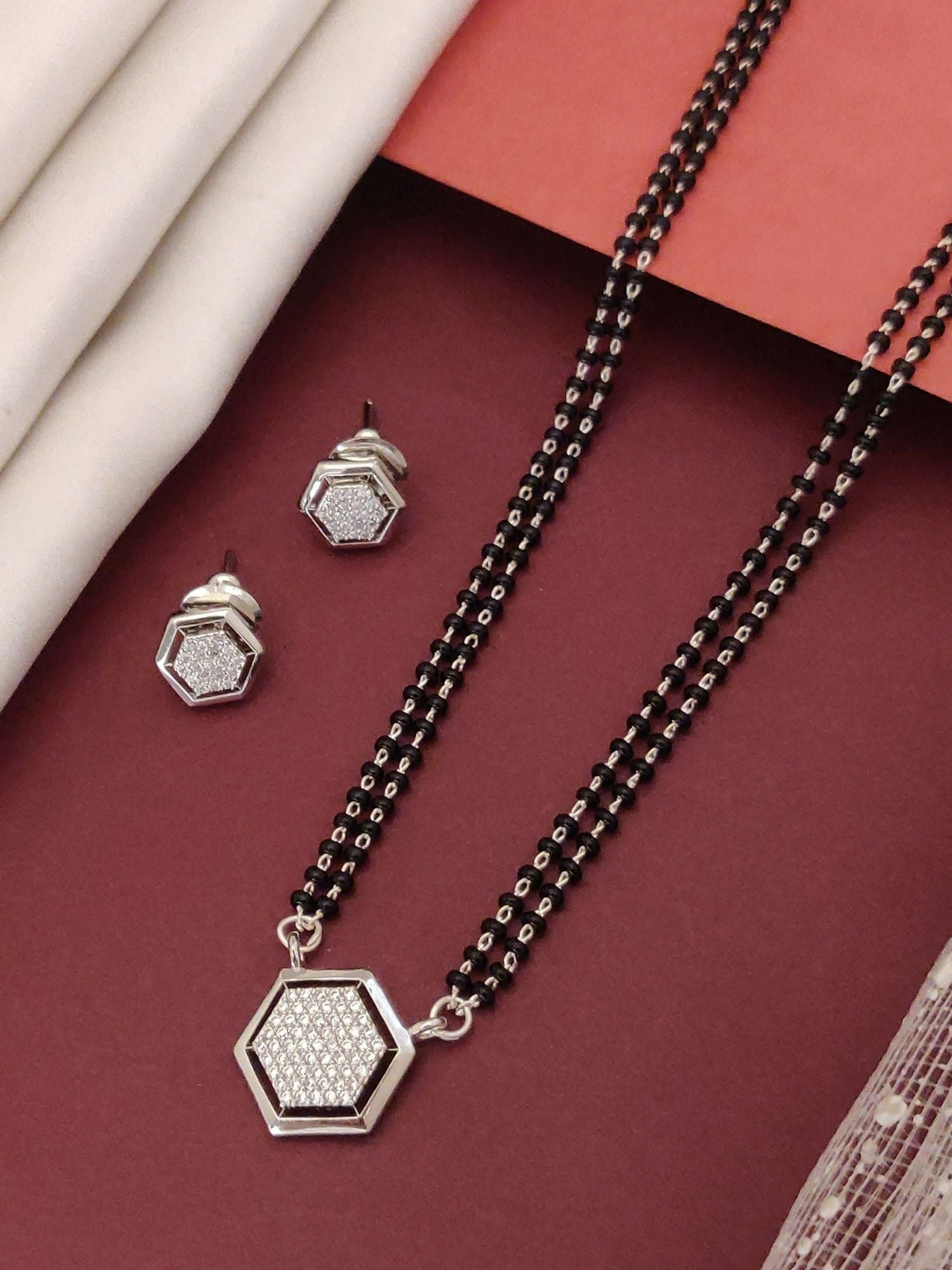 Stylish Silver Plated American Diamond Mangalsutra Set with Elegant Hexagonal Pendant and Matching Earrings