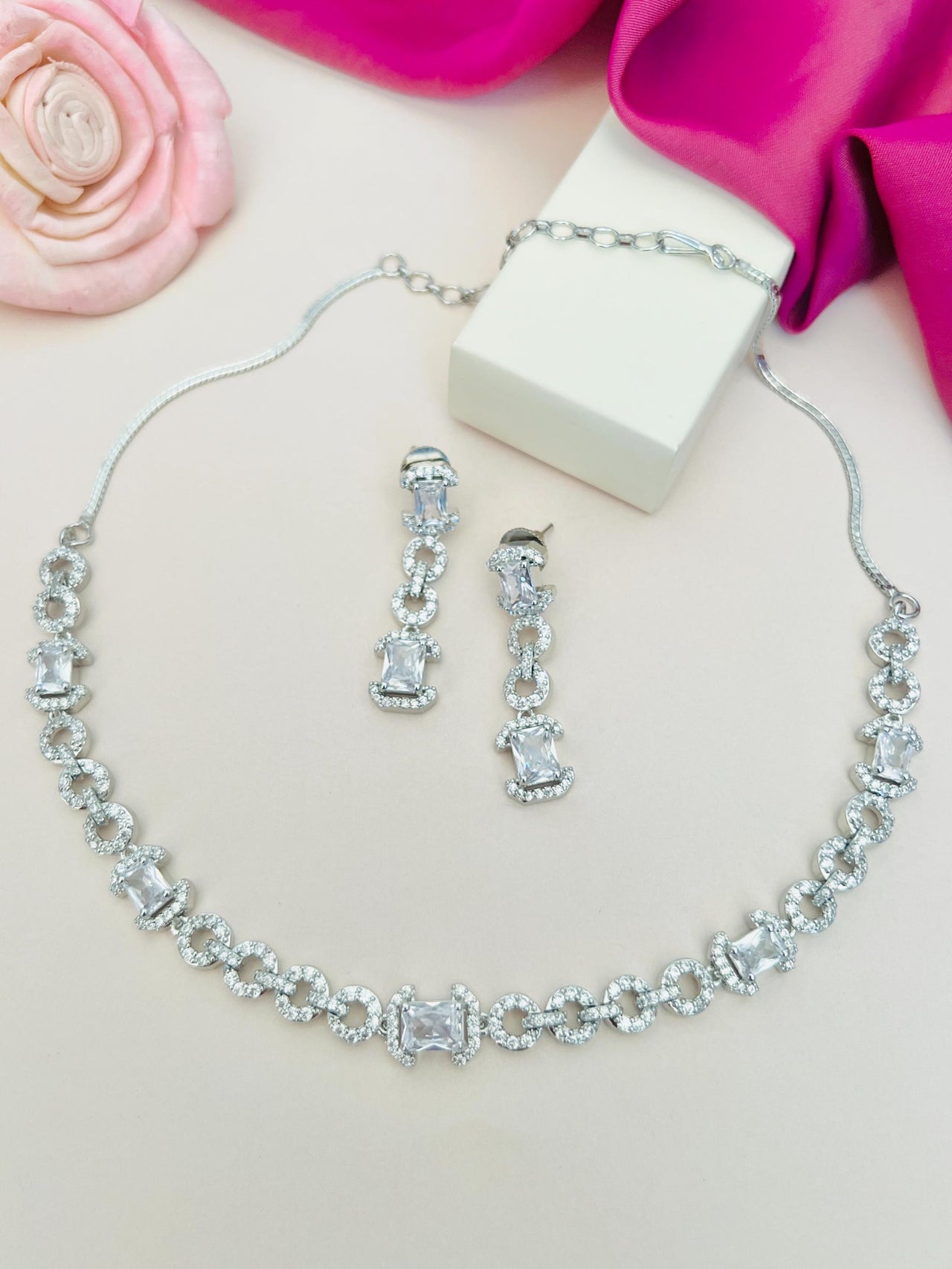 Silver Plated American Diamond Necklace with matching earrings by Abdesignsjewellery on white background