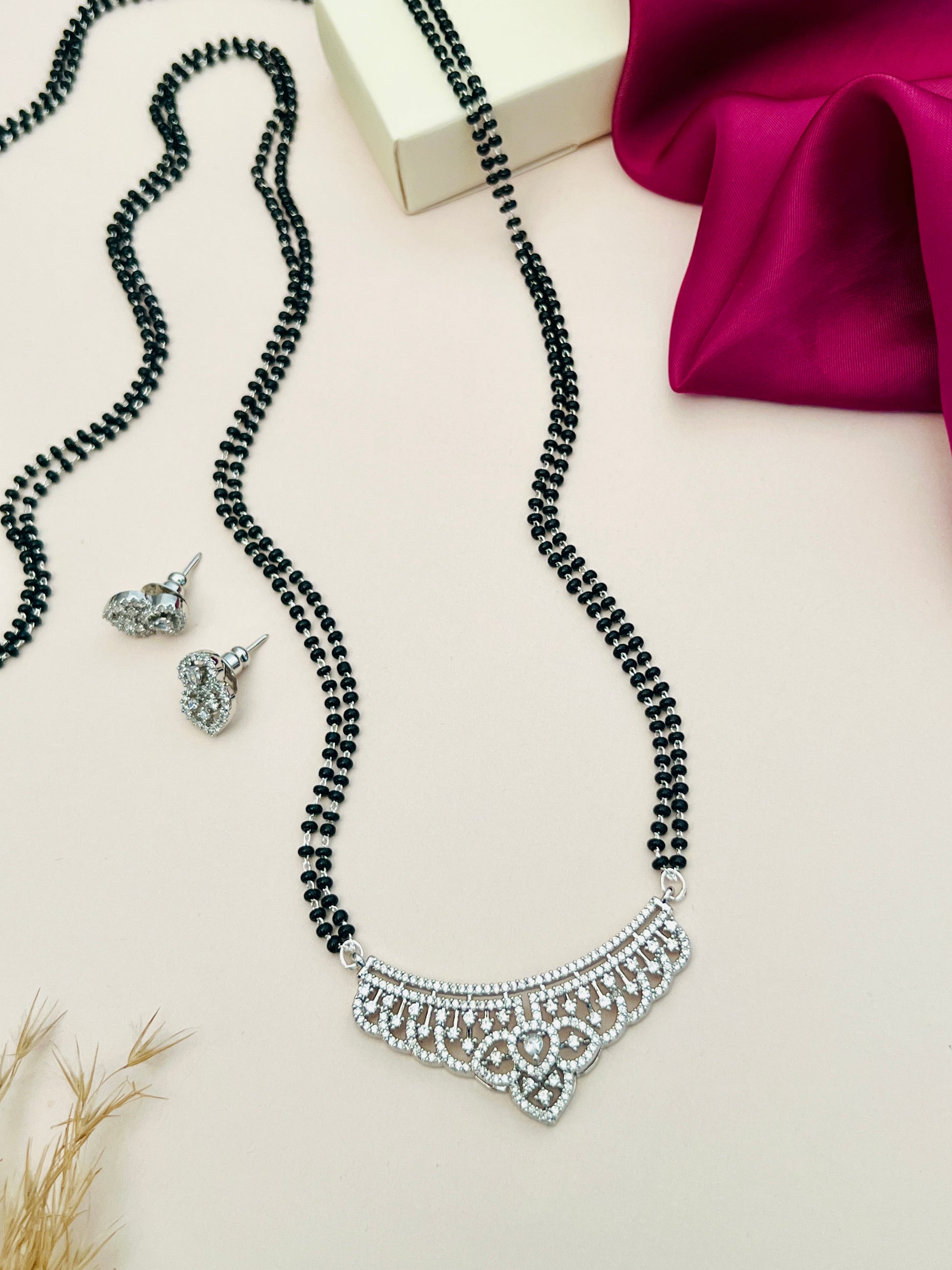 Abdesignsjewellery silver plated mangalsutra set with black beads and intricate pendant design with matching earrings