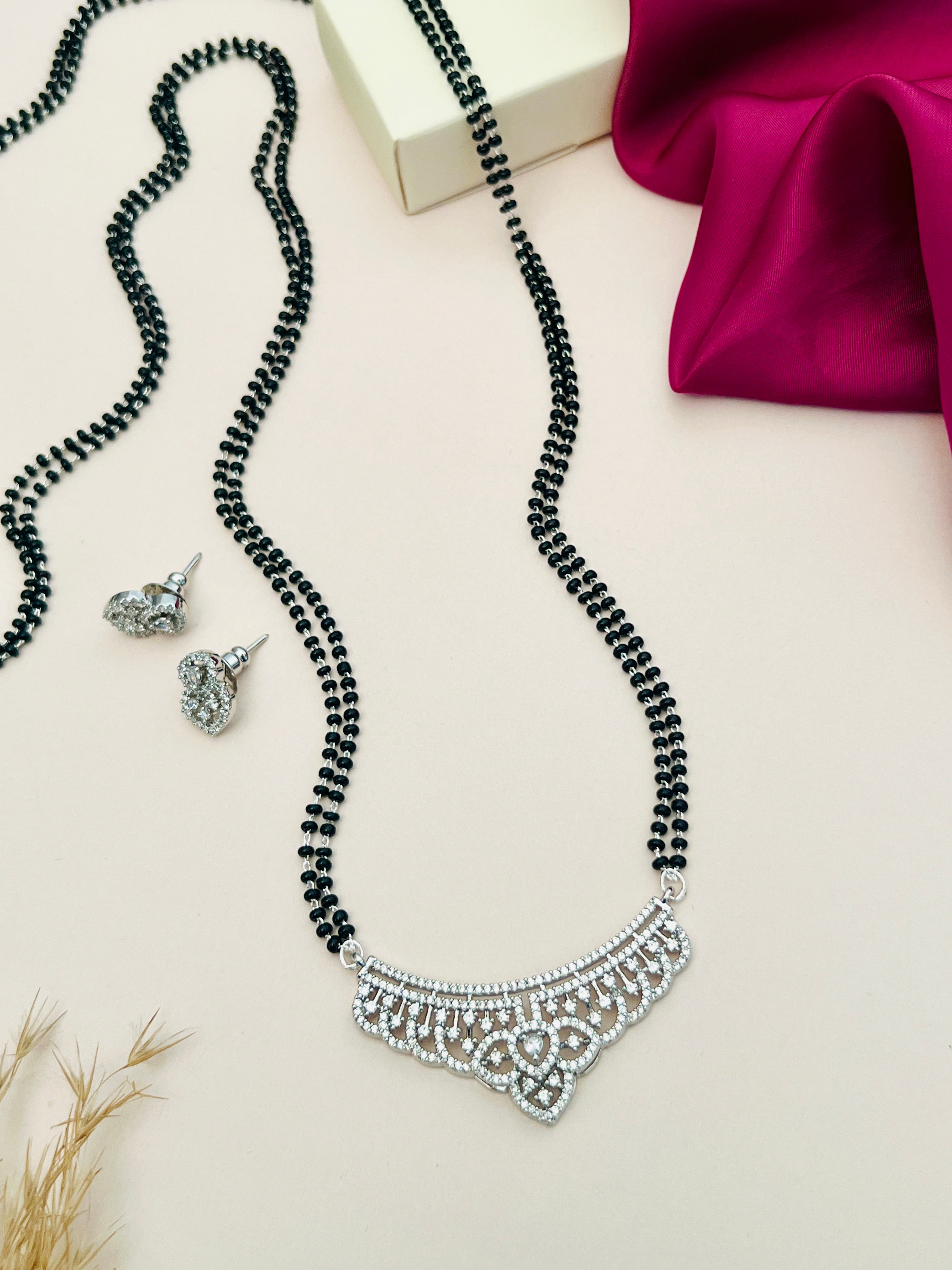 Abdesignsjewellery silver plated mangalsutra set with black beads and intricate pendant design with matching earrings