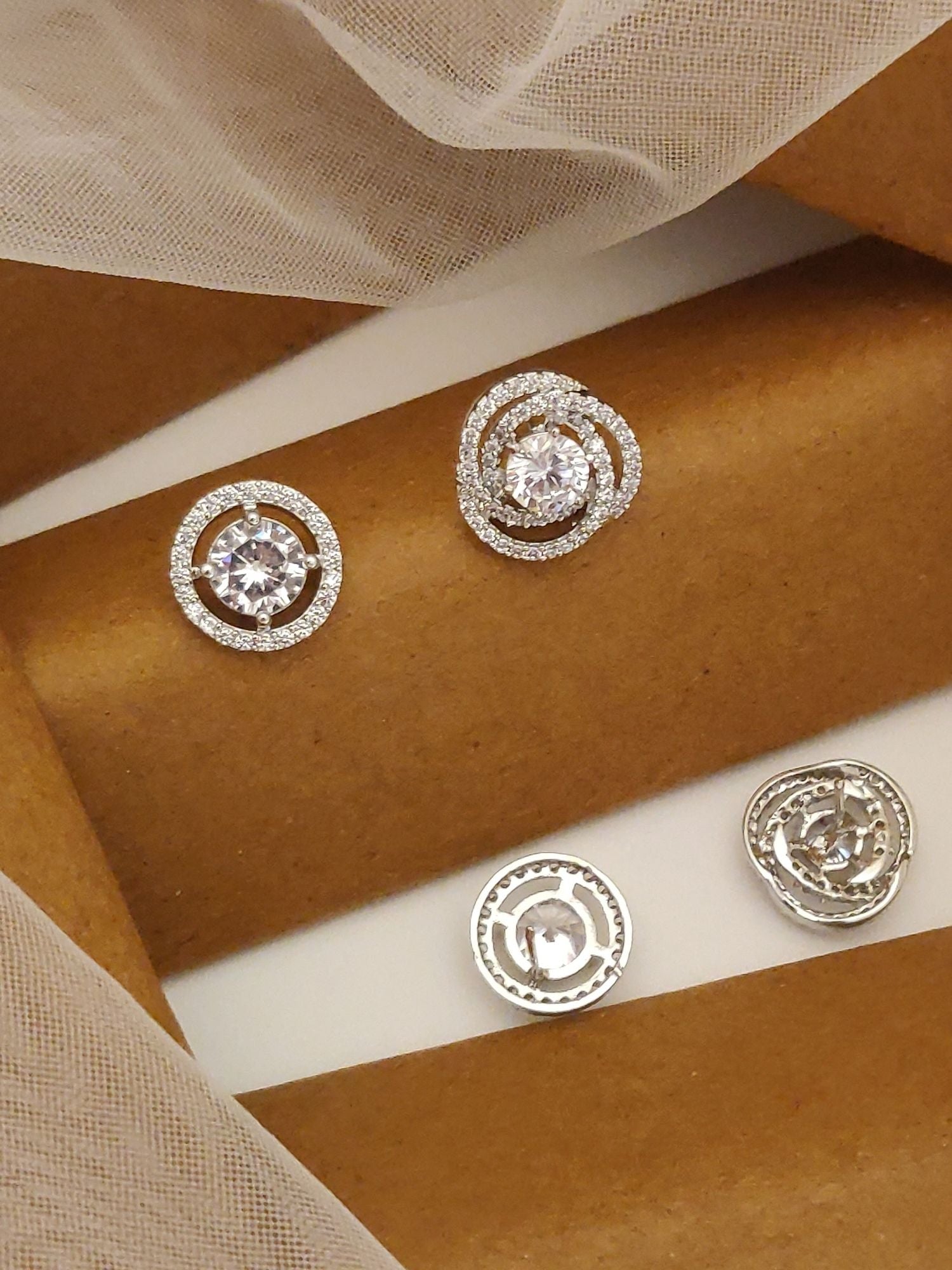 Silver Plated Studs Earring Combo featuring sparkling crystal designs on a stylish background