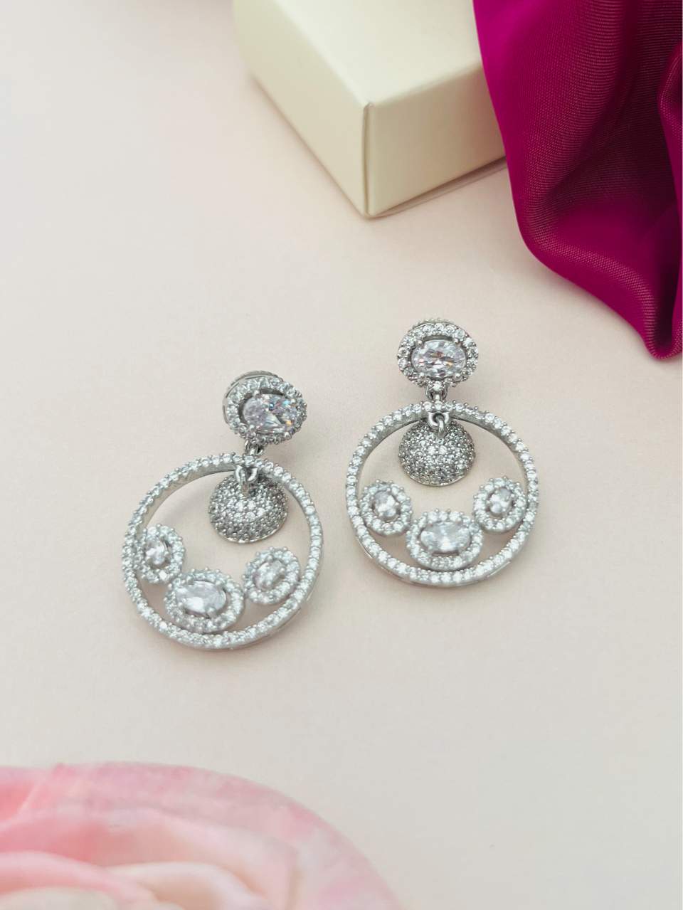 Sophisticated American Diamond Silver Plated Earrings by Abdesignsjewellery with round and oval stones in a circular design