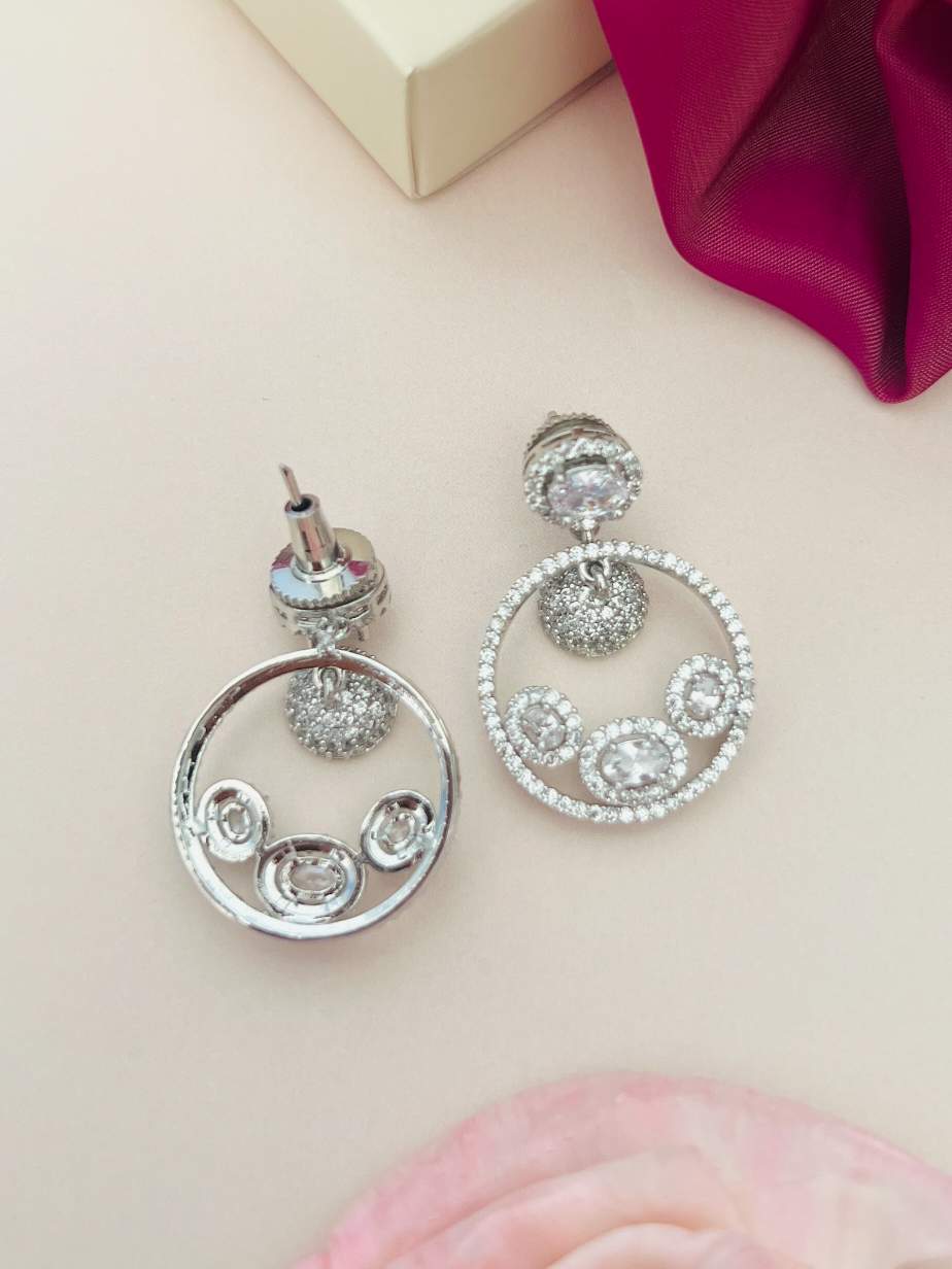 Sophisticated American Diamond Silver Plated Earrings with circular design and sparkling stones by Abdesignsjewellery