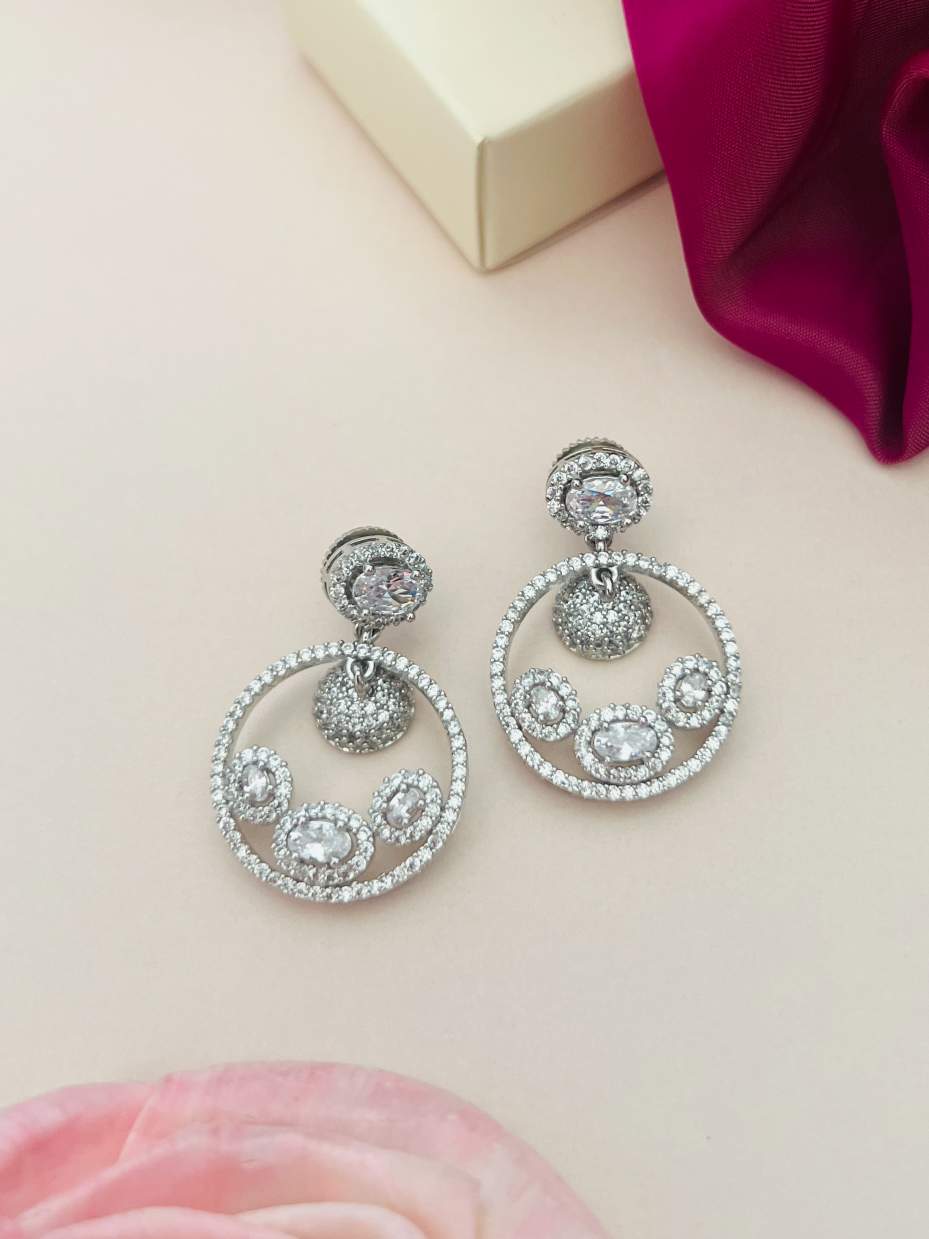 Sophisticated American Diamond Silver Plated Earrings with circular design and sparkling stones