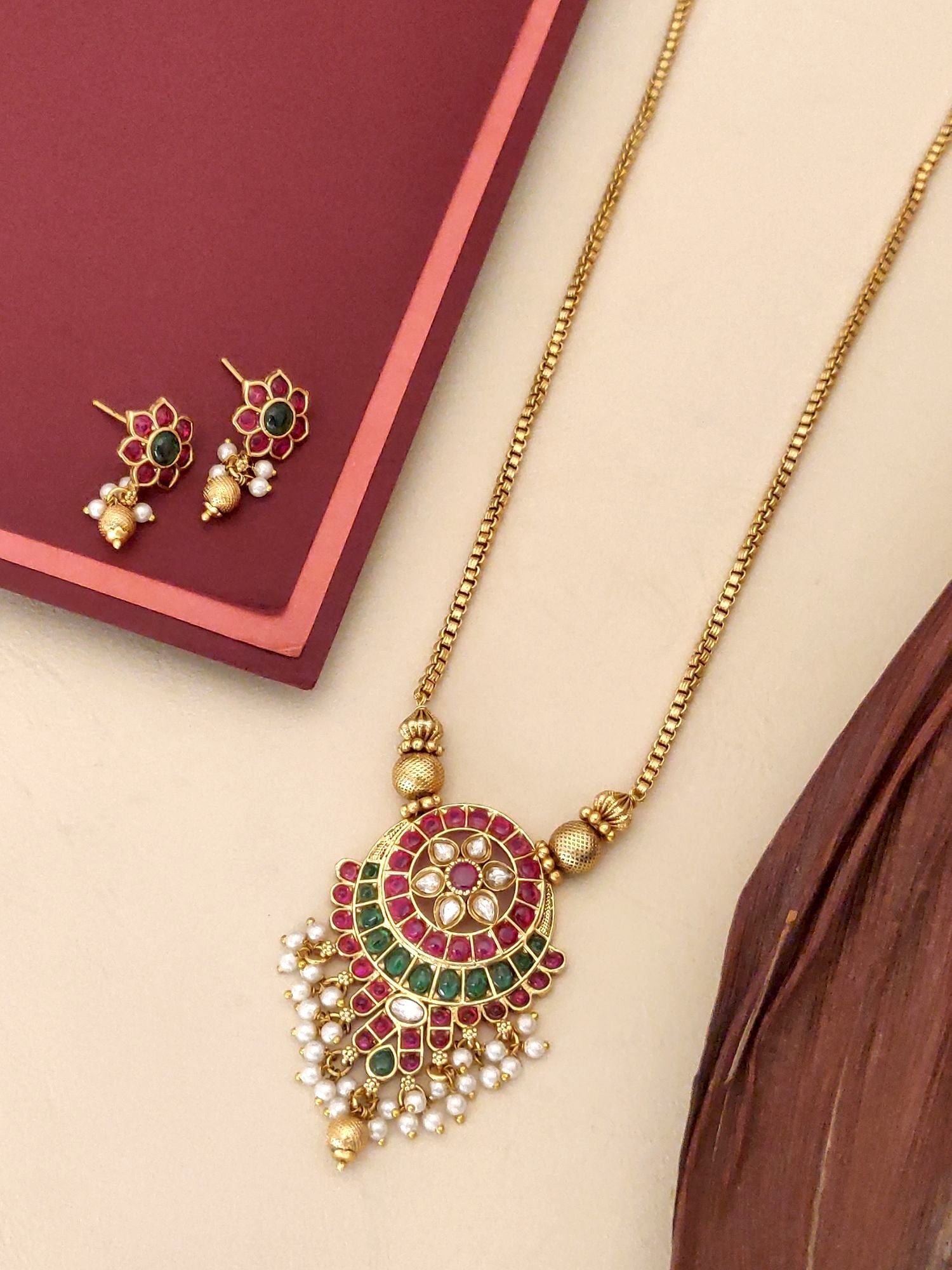 South Indian antique necklace set with gold chain, colorful stones, and matching earrings by Abdesignsjewellery