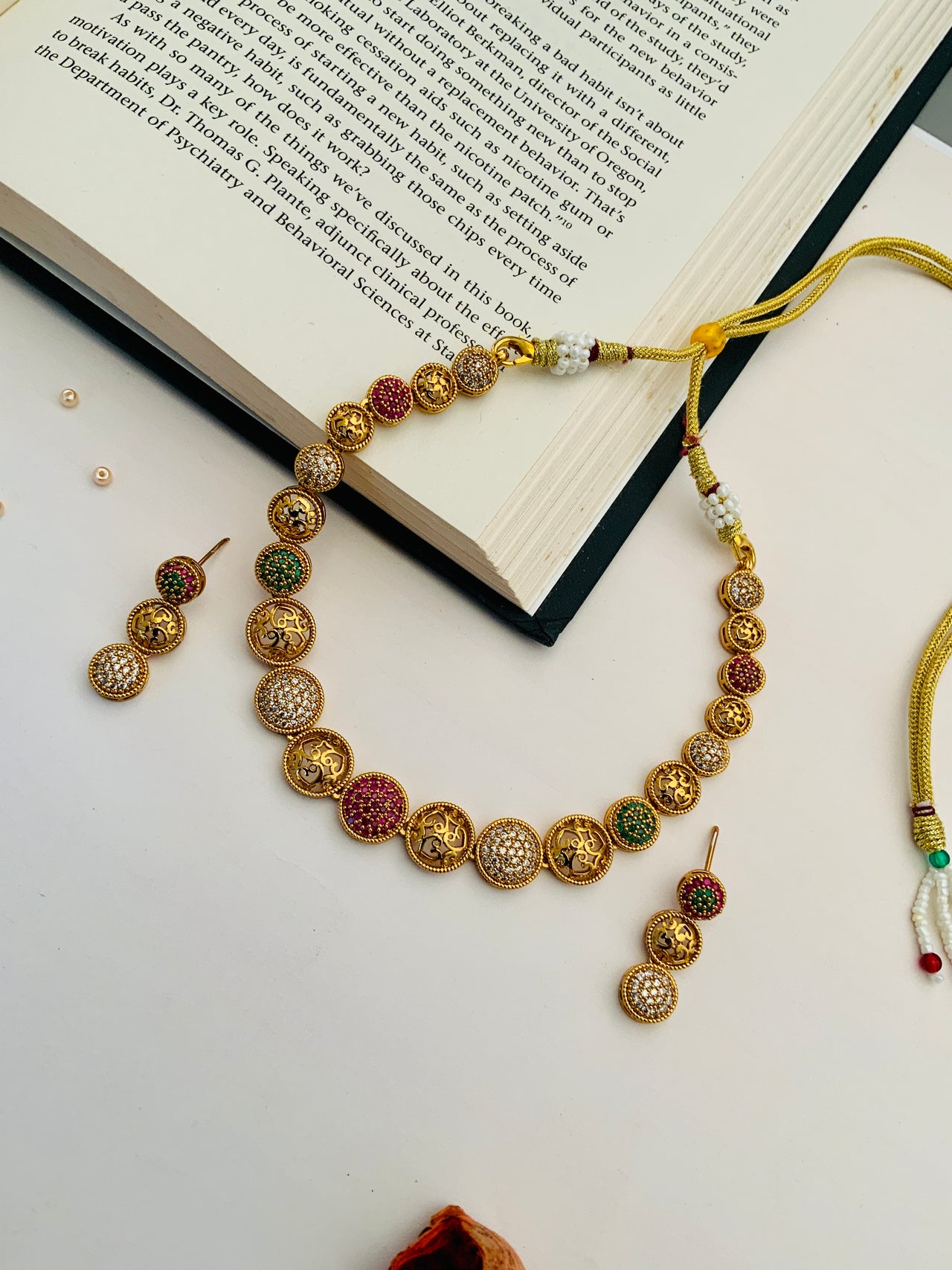 South Indian gold plated necklace with intricate round designs and matching earrings by Abdesignsjewellery