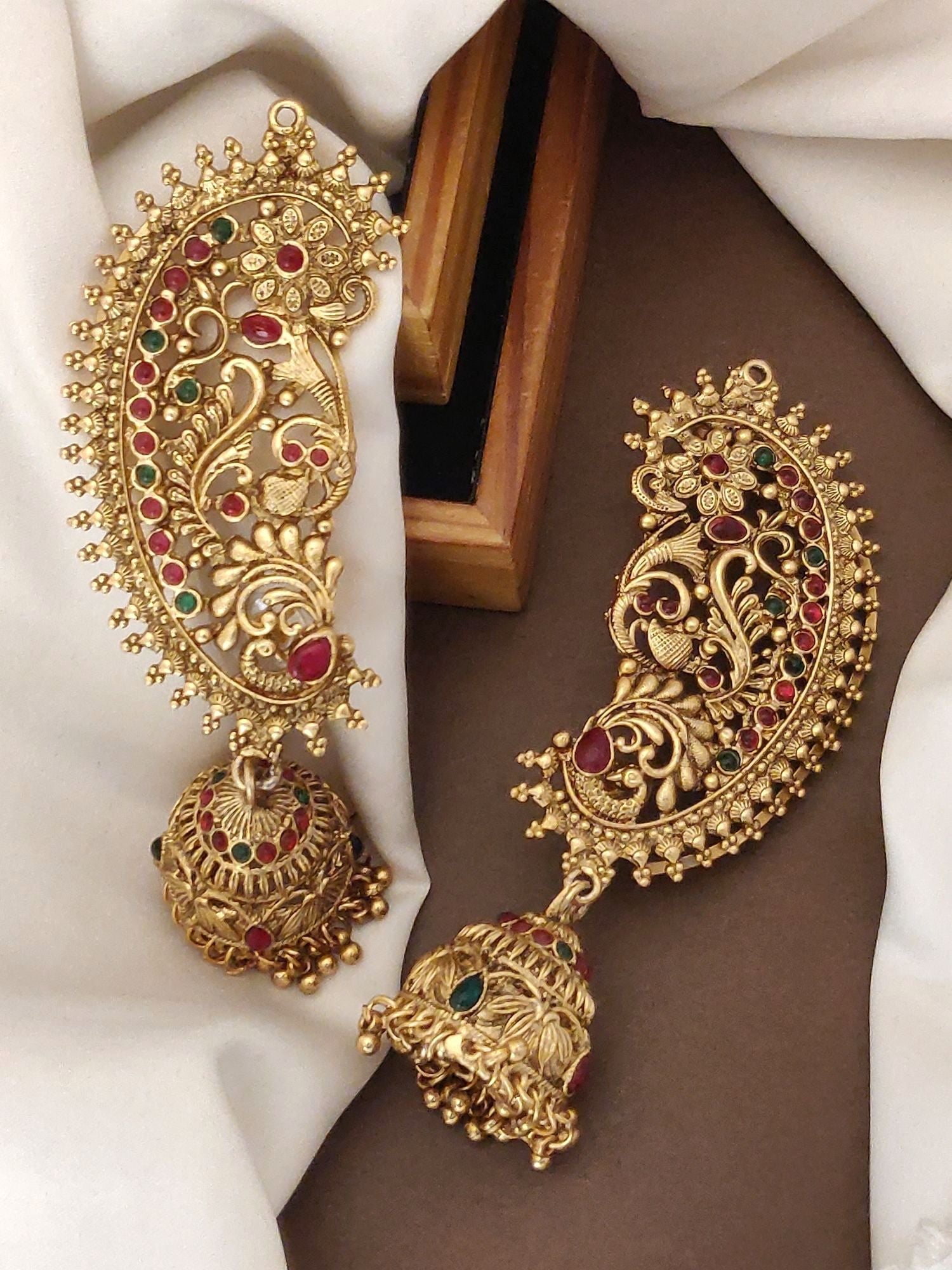 Elegant South Indian style gold plated ear cuffs with intricate design and colorful stones