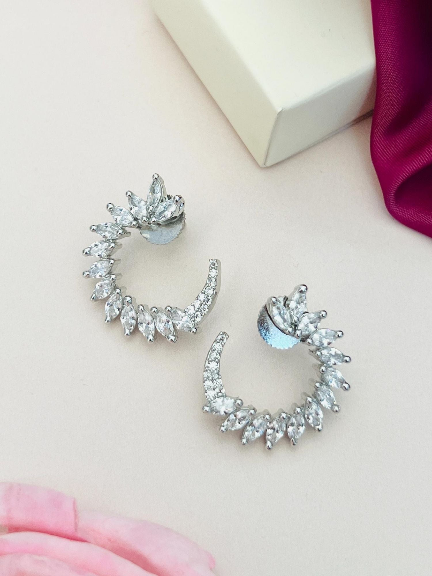 Sparkling Silver Plated American Diamond Stud Earring with marquise shaped stones in a curved design