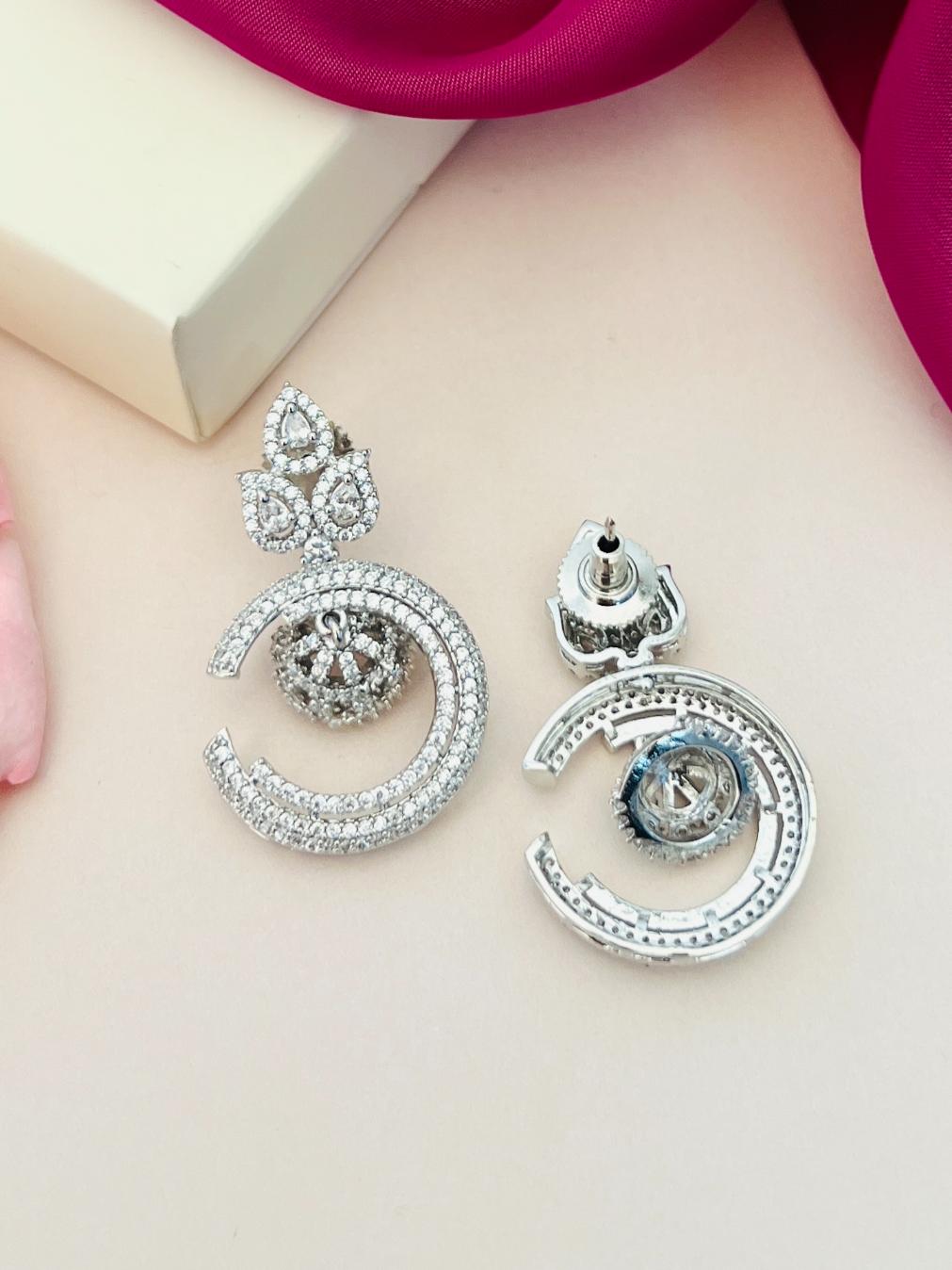 Stunning American Diamond Silver Plated Earring by Abdesignsjewellery with intricate circular design and sparkling stones