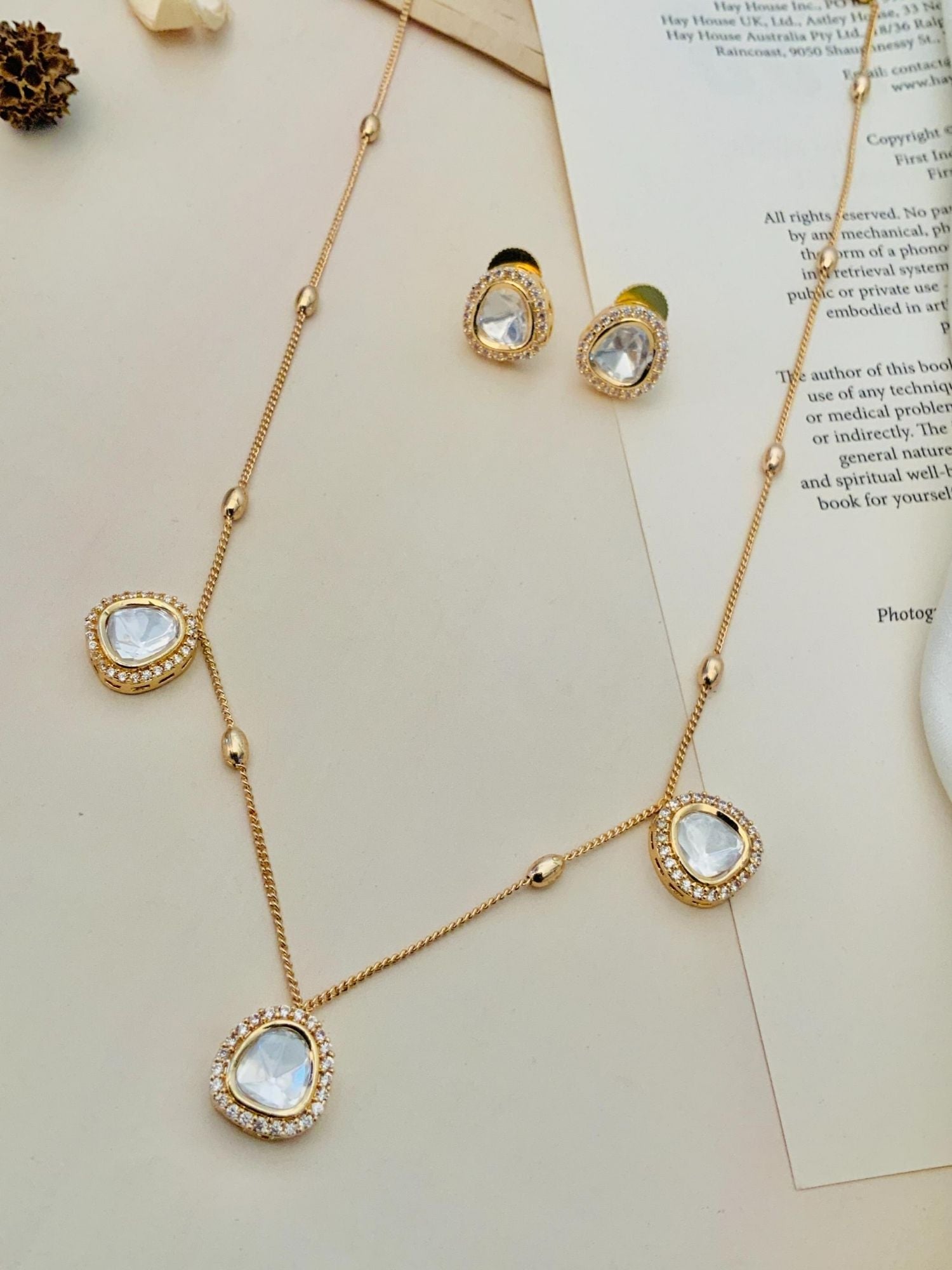 Stunning Gold Plated Uncut Polki Pendant Chain featuring teardrop-shaped pendants and matching earrings