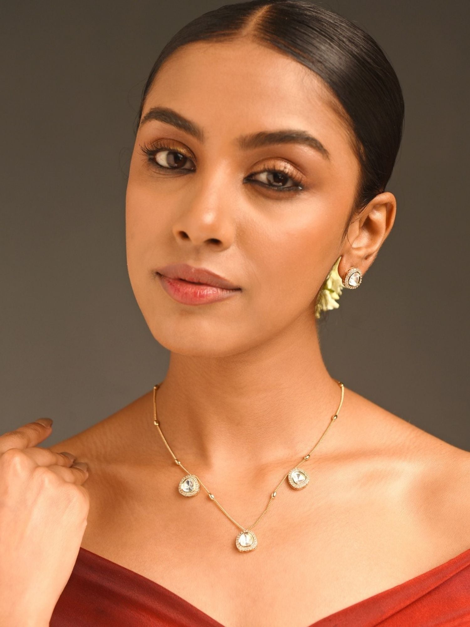 Stunning Gold Plated Uncut Polki Pendant Chain worn by woman with elegant style and minimalist design