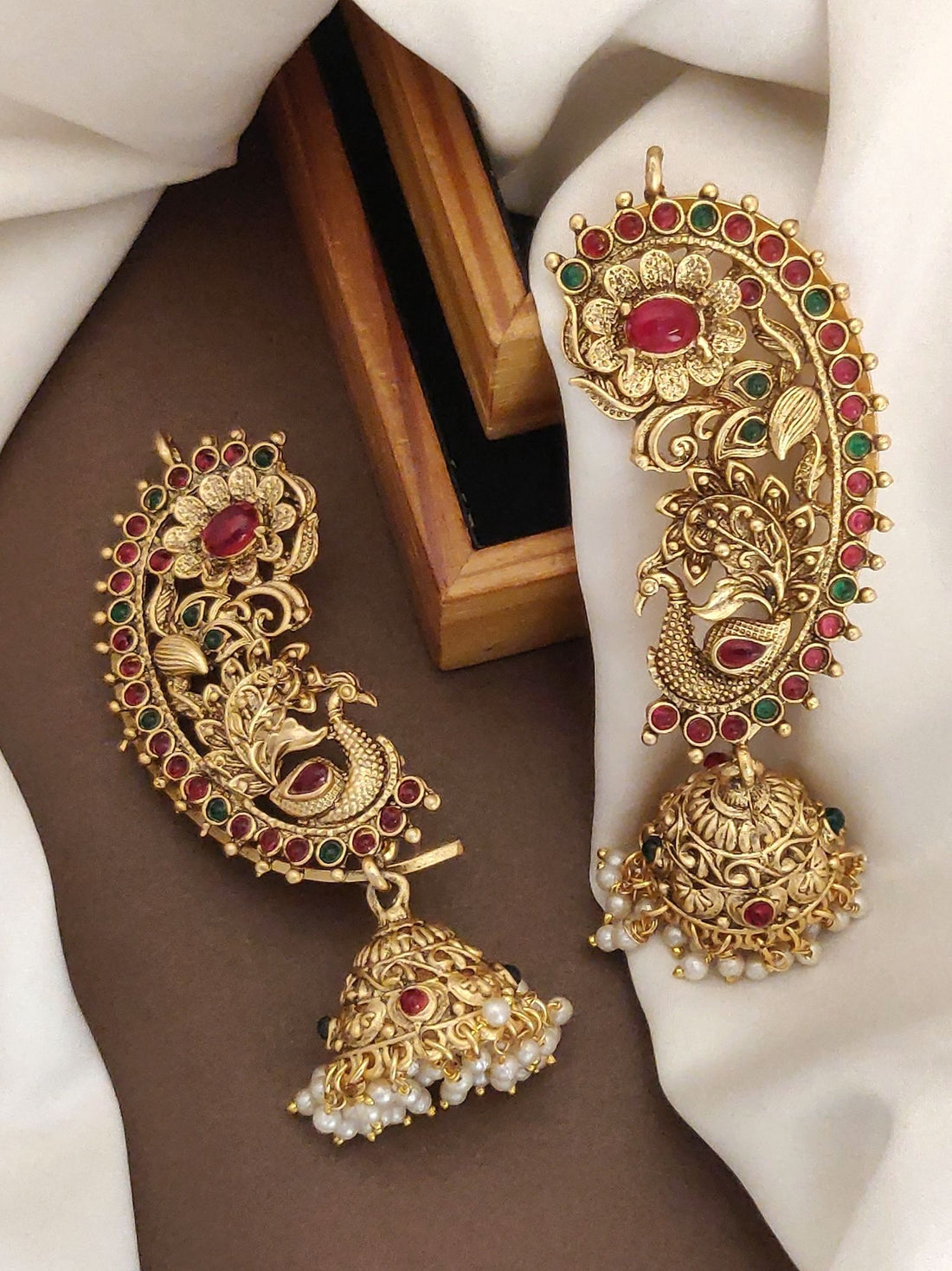 Abdesignsjewellery traditional gold plated ear cuffs with red stones and pearl jhumka detailing on model