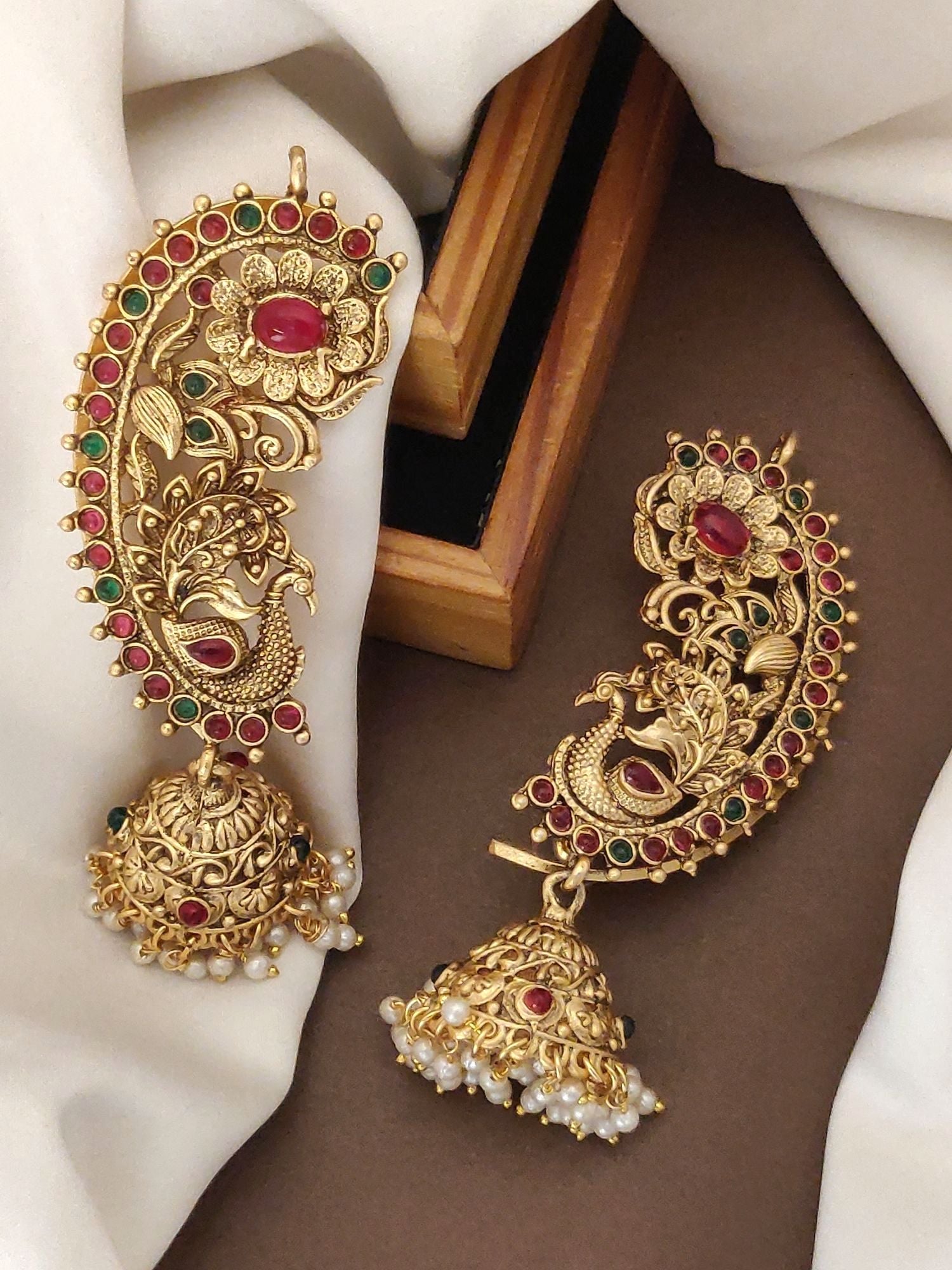 Abdesignsjewellery ornate peacock earrings with jhumka pearls and red and green stones traditional gold plated ear cuffs