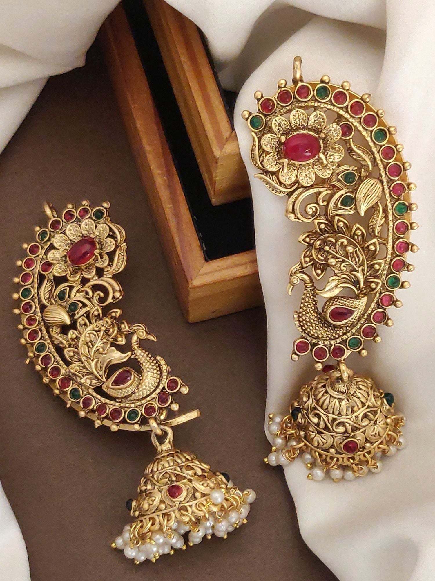 Abdesignsjewellery traditional gold plated ear cuffs with peacock motif red green stones and pearl jhumka