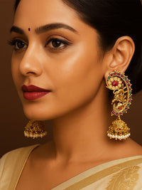 Thumbnail for Stunning model wearing traditional gold plated ear cuffs with intricate floral design and colorful stones