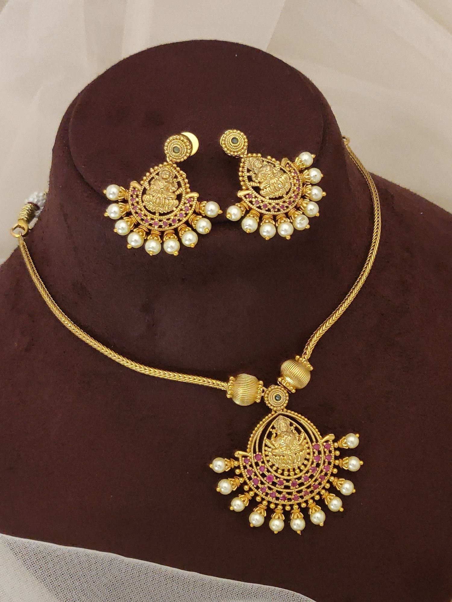 traditional Indian gold look necklace set Abdesignsjewellery with crescent pendant pearl drops and pink stones