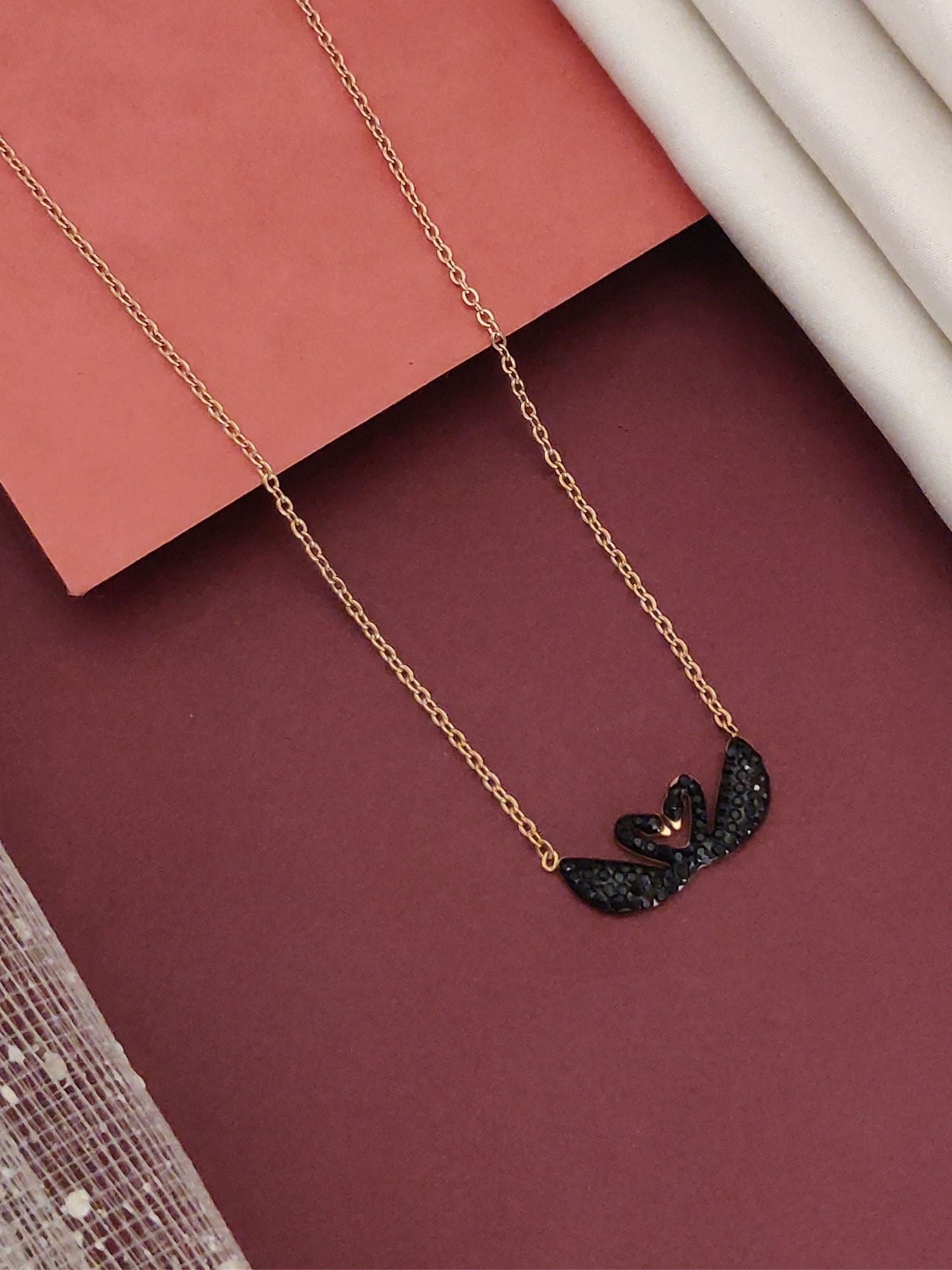 Twin Black Swan Pendant Necklace in Gold with Intricate Black Detail for Elegant Style