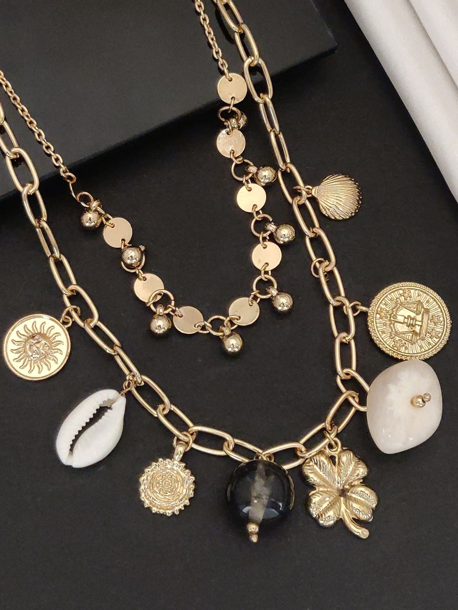 Layered gold pendants chain with charms for a trendy look in western fashion jewelry necklace