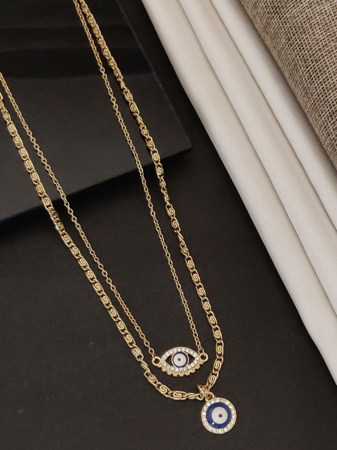 Western Gold Plated EvilEye Layered Necklace featuring a delicate design with sparkling accents