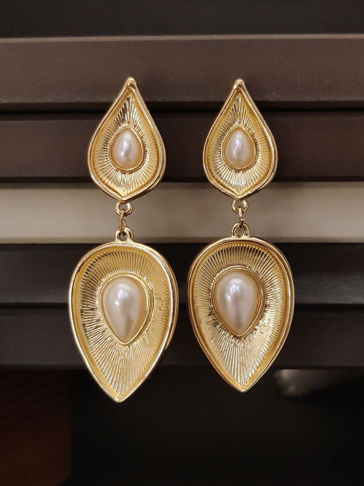 Western Gold Plated Long Earring with intricate detailing and elegant pearl accents