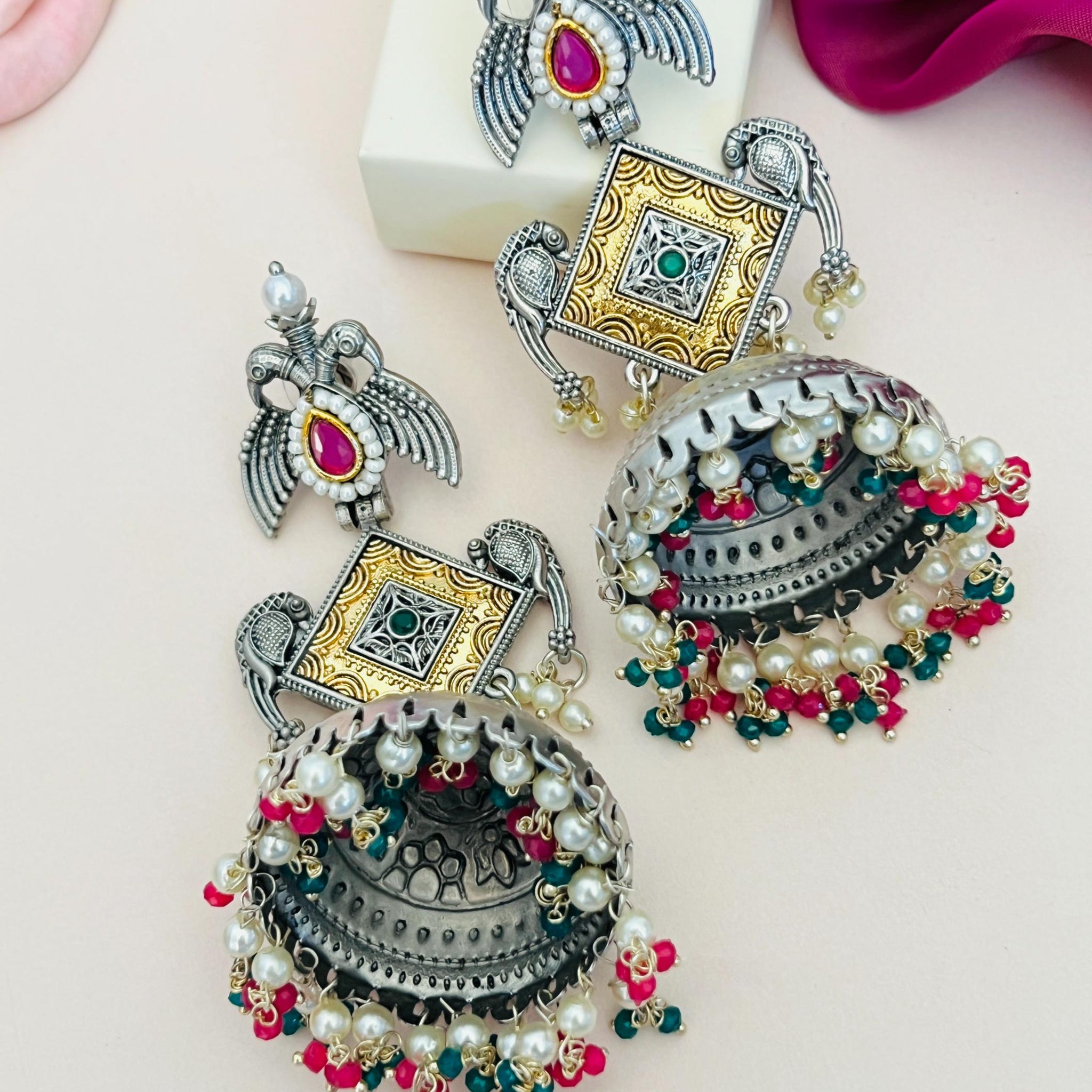 Long German Silver Plated Jhumka Earring with intricate design and colorful bead detailing by Abdesignsjewellery