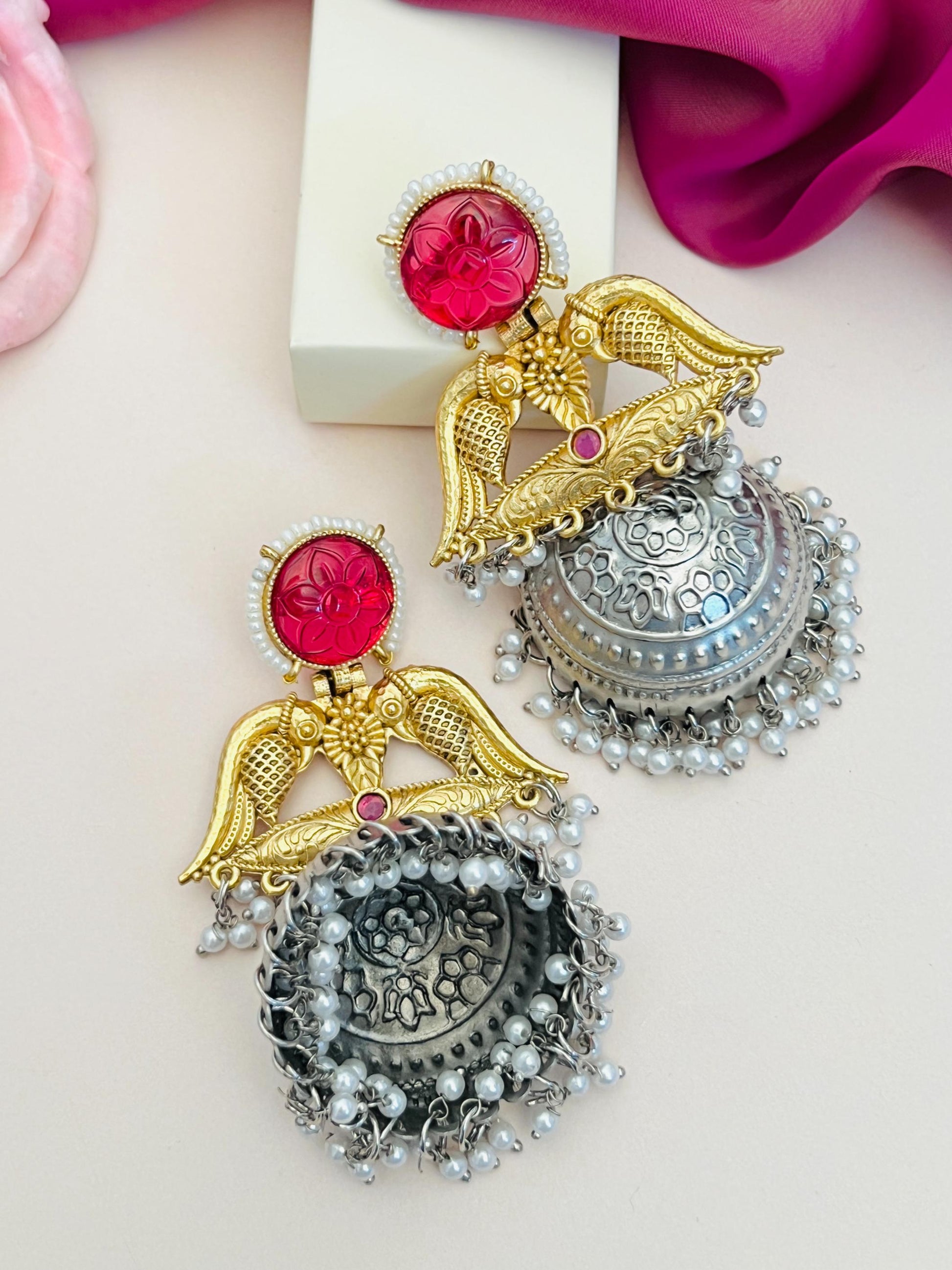 Long Gold Plated Jhumka Earring with intricate detailing and vibrant red accents for stylish occasions