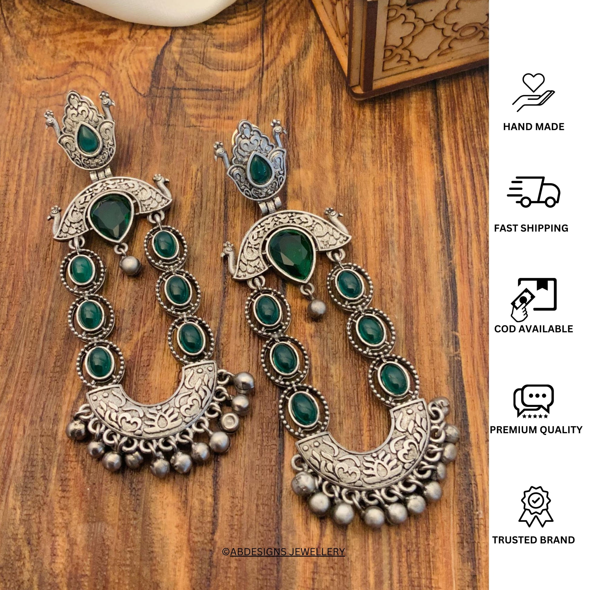 Long Peacock German Silver Earrings by Abdesignsjewellery with green stones and intricate detailing