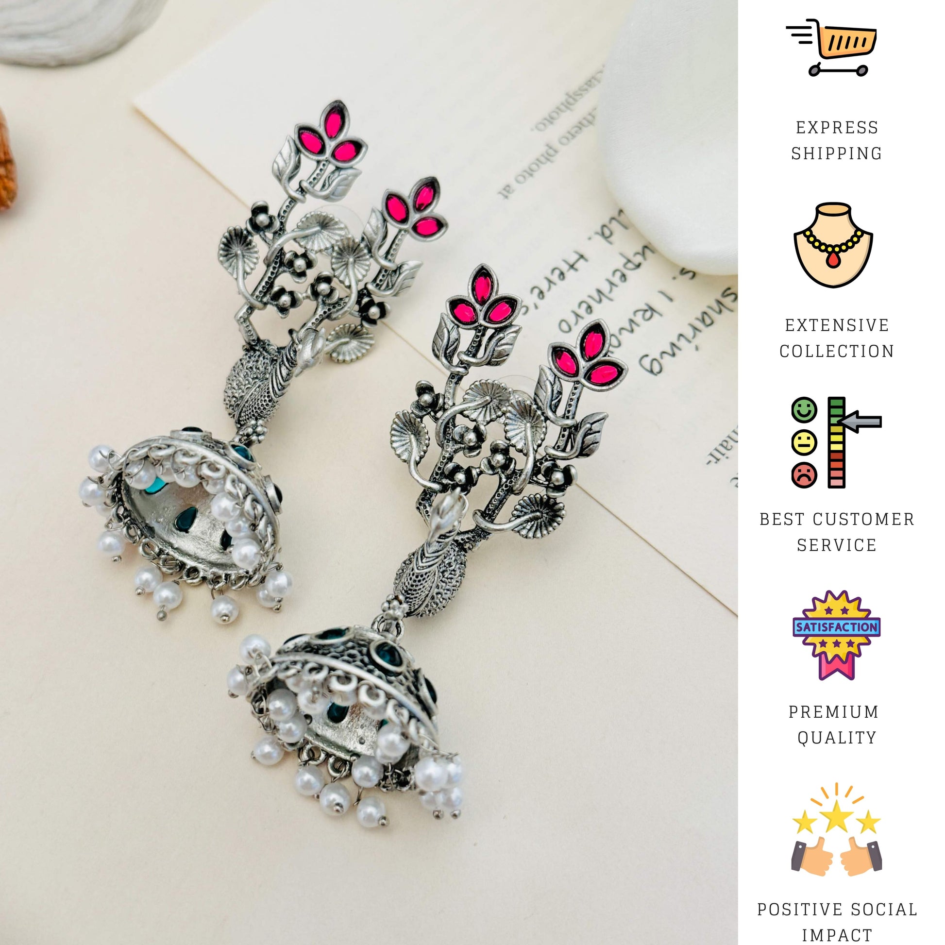 Long Peacock German Silver Plated Earrings with intricate floral design and hanging pearl details by Abdesignsjewellery