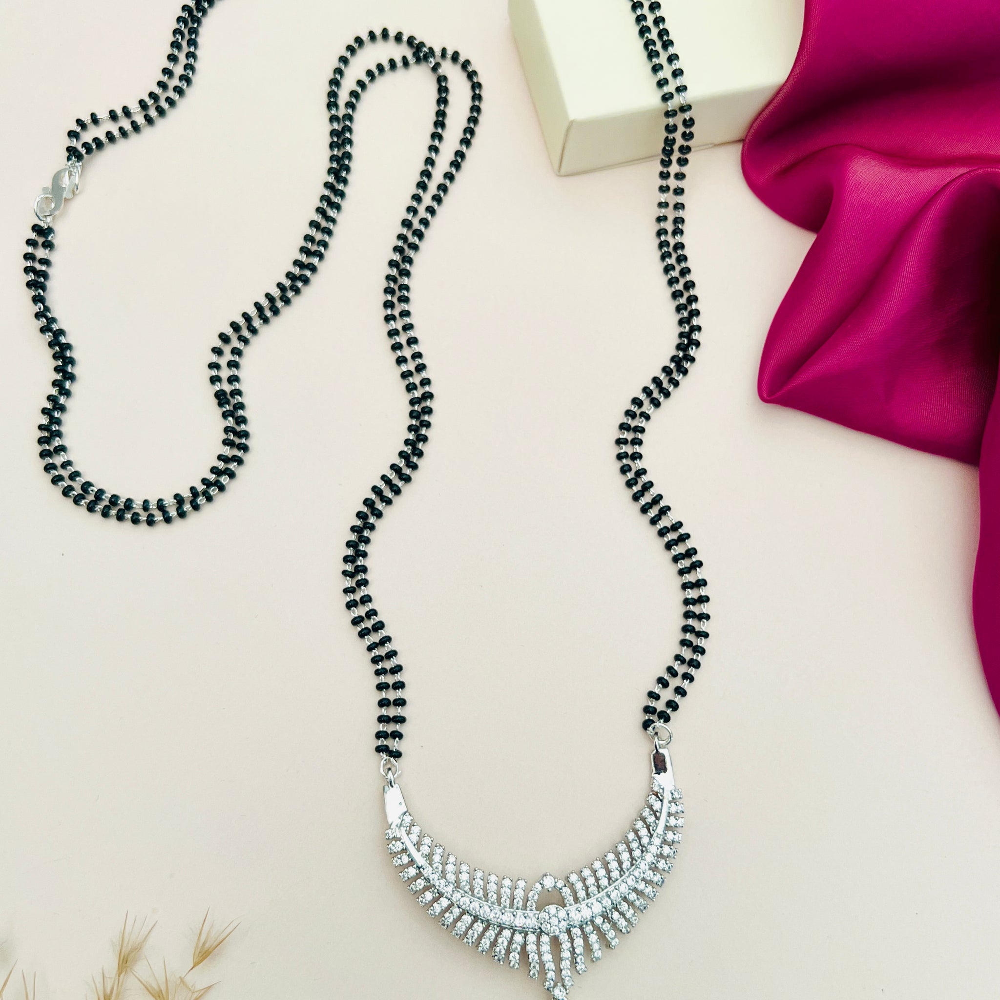 Elegant Long Silver Mangalsutra with black beads and intricate pendant by Abdesignsjewellery