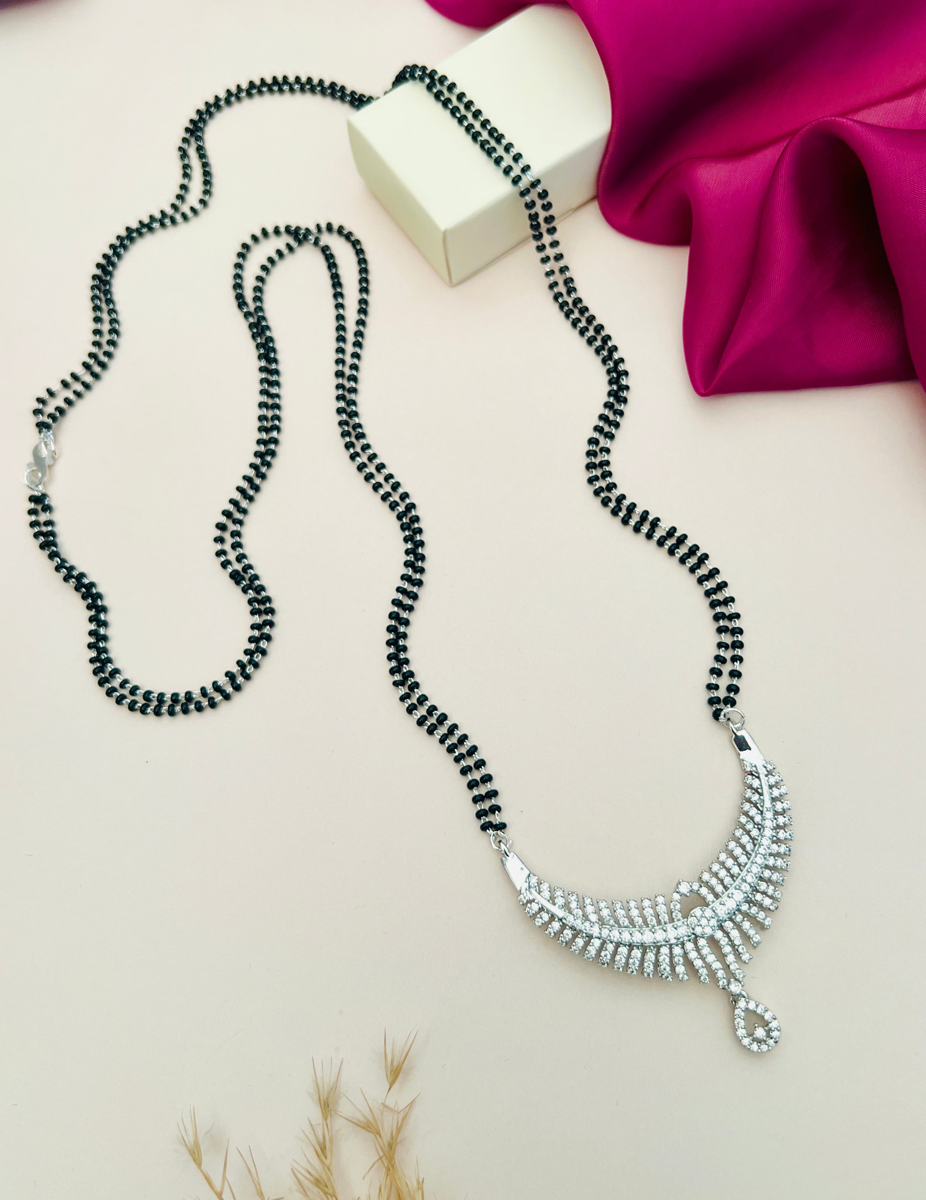 Abdesigns jewellery elegant long silver mangalsutra with black bead chain and intricate pendant design