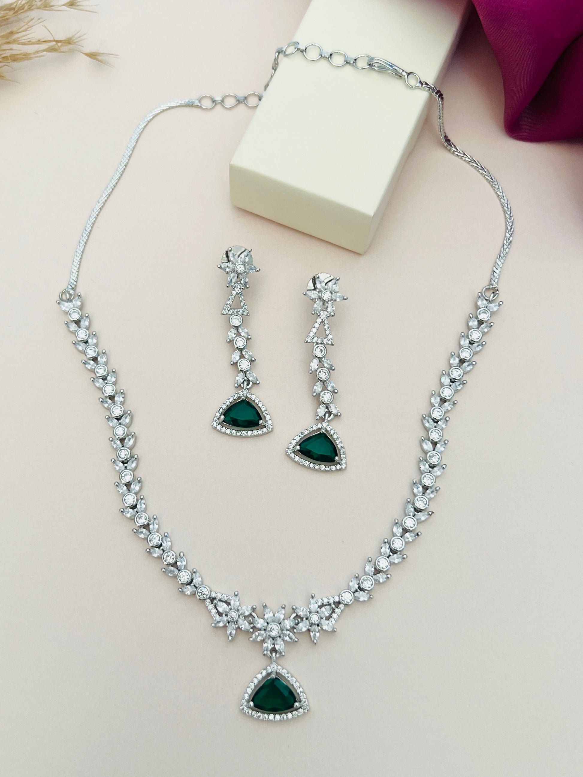 Luxurious Silver Plated American Diamond Necklace with matching earrings featuring green stones from Abdesignsjewellery