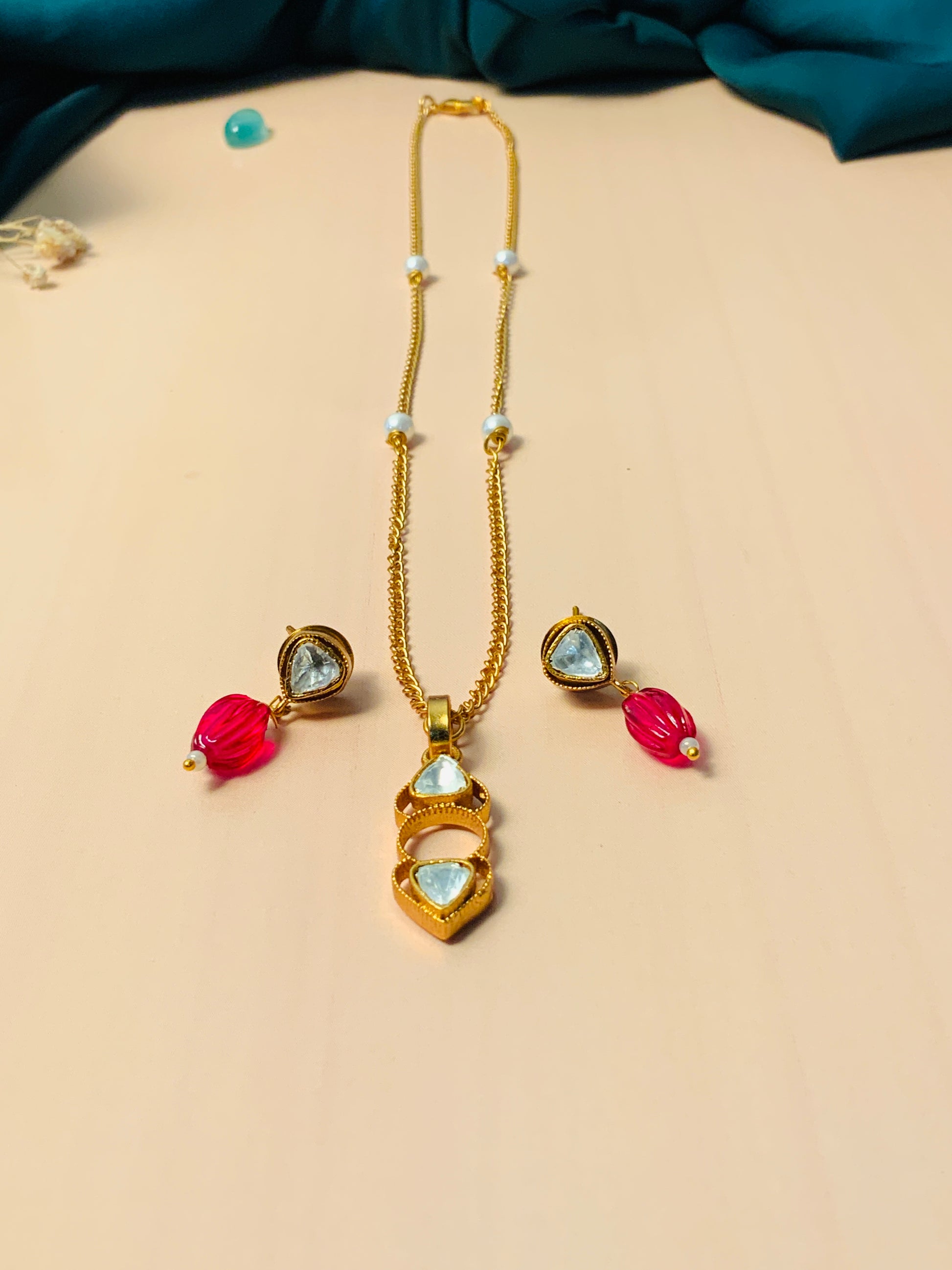 Minimal Polki Drop Necklace Set by Abdesignsjewellery featuring gold chain with white stones and matching pink drop earrings