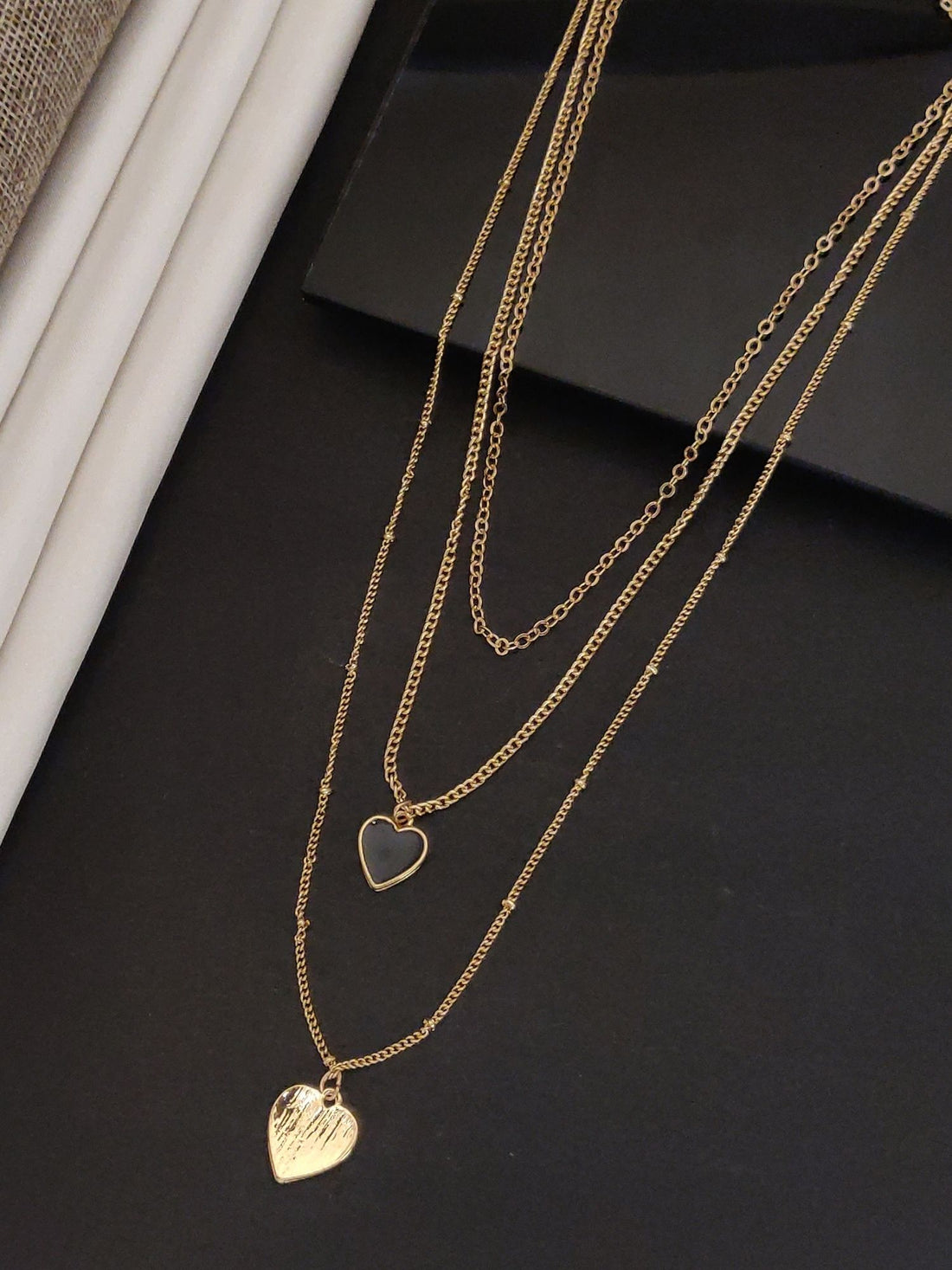 Minimal Western Gold Plated Heart Pendant Necklace featuring layered chains and delicate heart charms