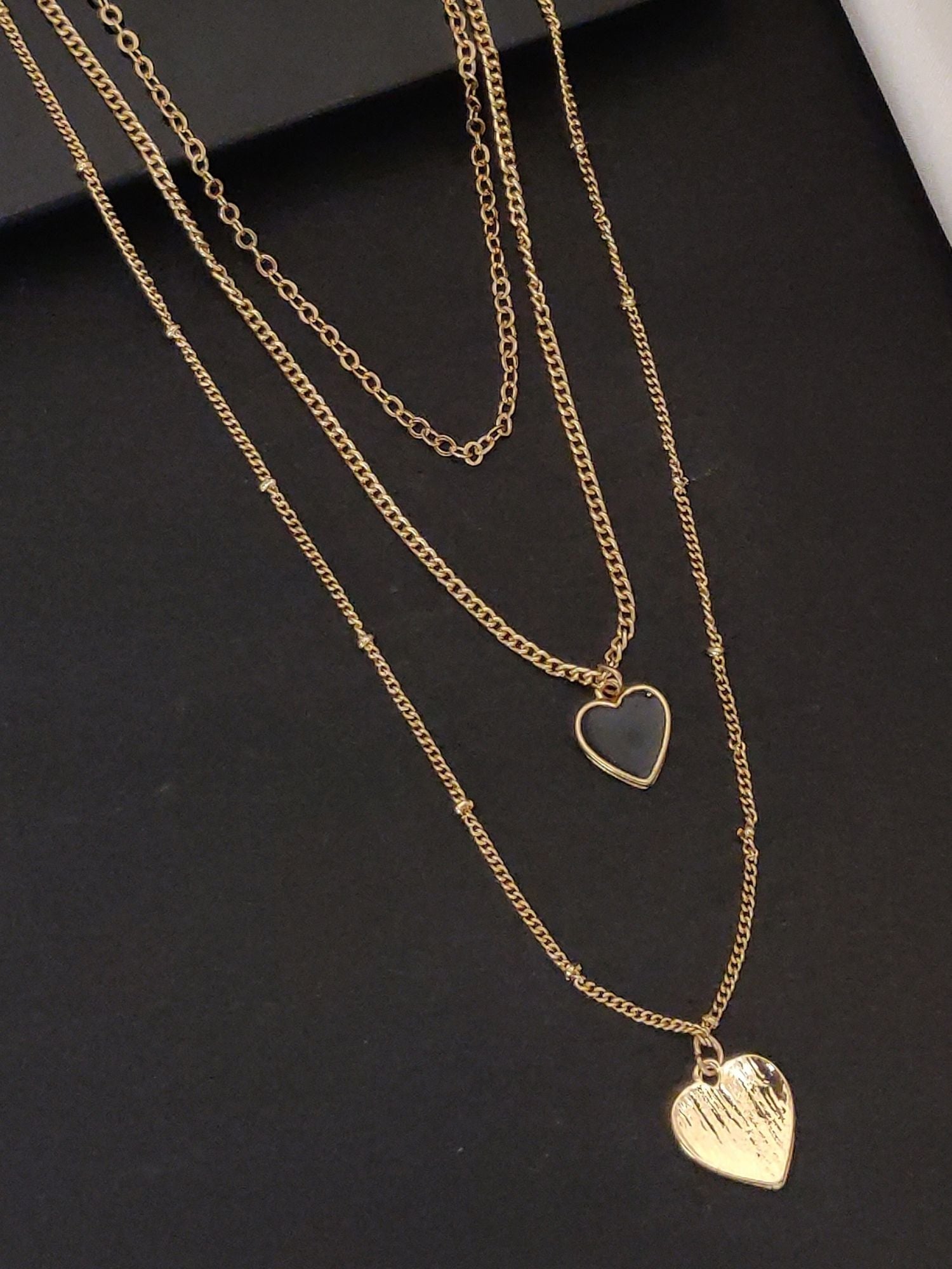 Minimal Western Gold Plated Heart Pendant Necklace layered with delicate chains and heart details