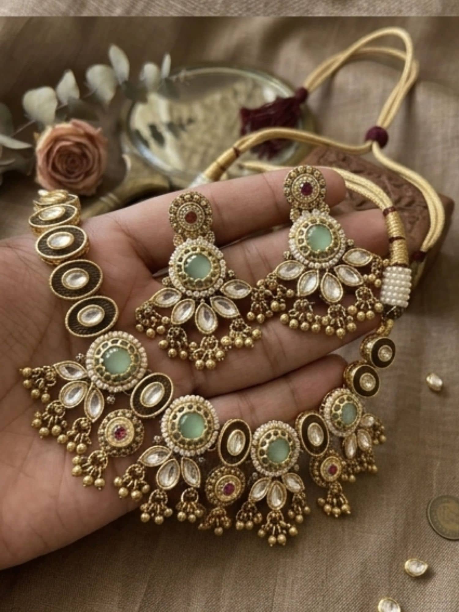Elegant necklace for gold with matching earrings featuring intricate design and gemstones