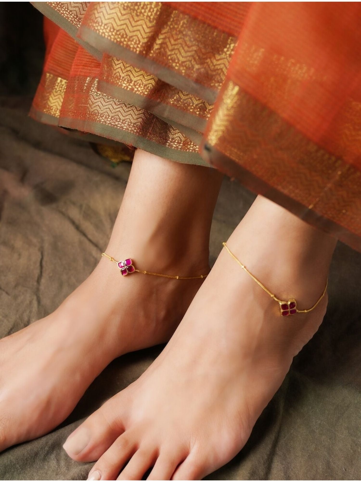 Paachi Kundan anklets for women by Abdesignsjewellery with delicate gold chain and red stone accents