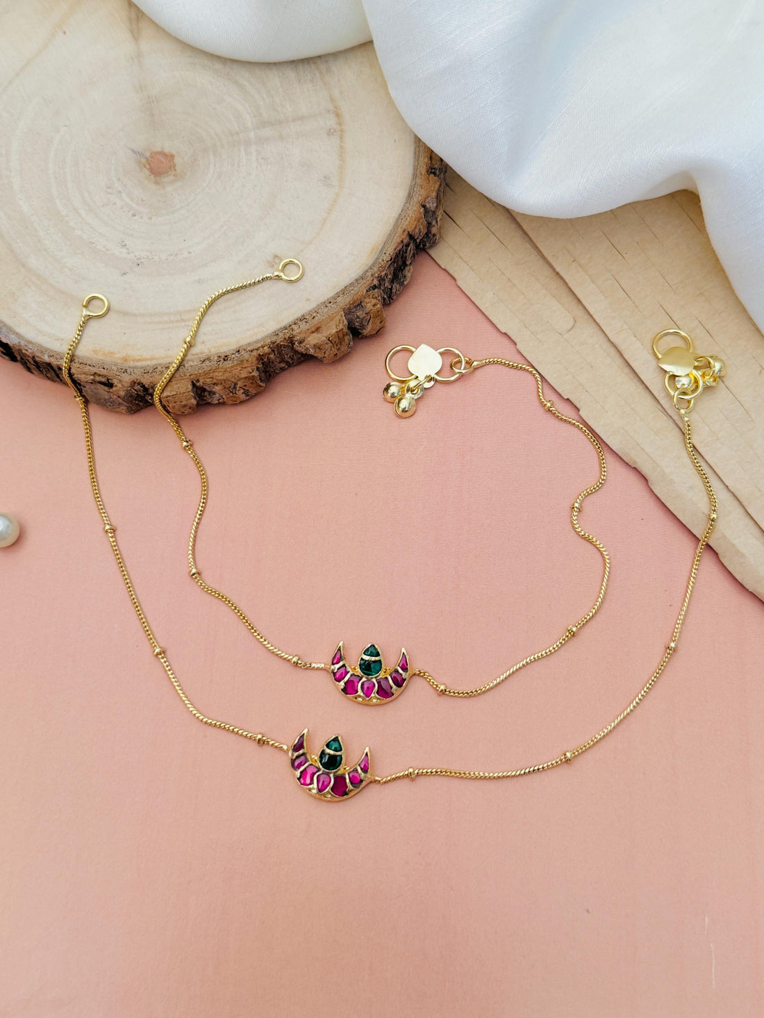Elegant Pachi Kundan Kemp Stone Anklets combo with gold chains on female feet by Abdesignsjewellery