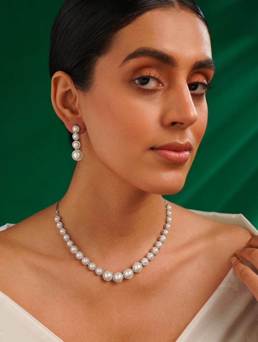 Pearl American Diamond Necklace Set by Abdesignsjewellery worn by woman with matching earrings