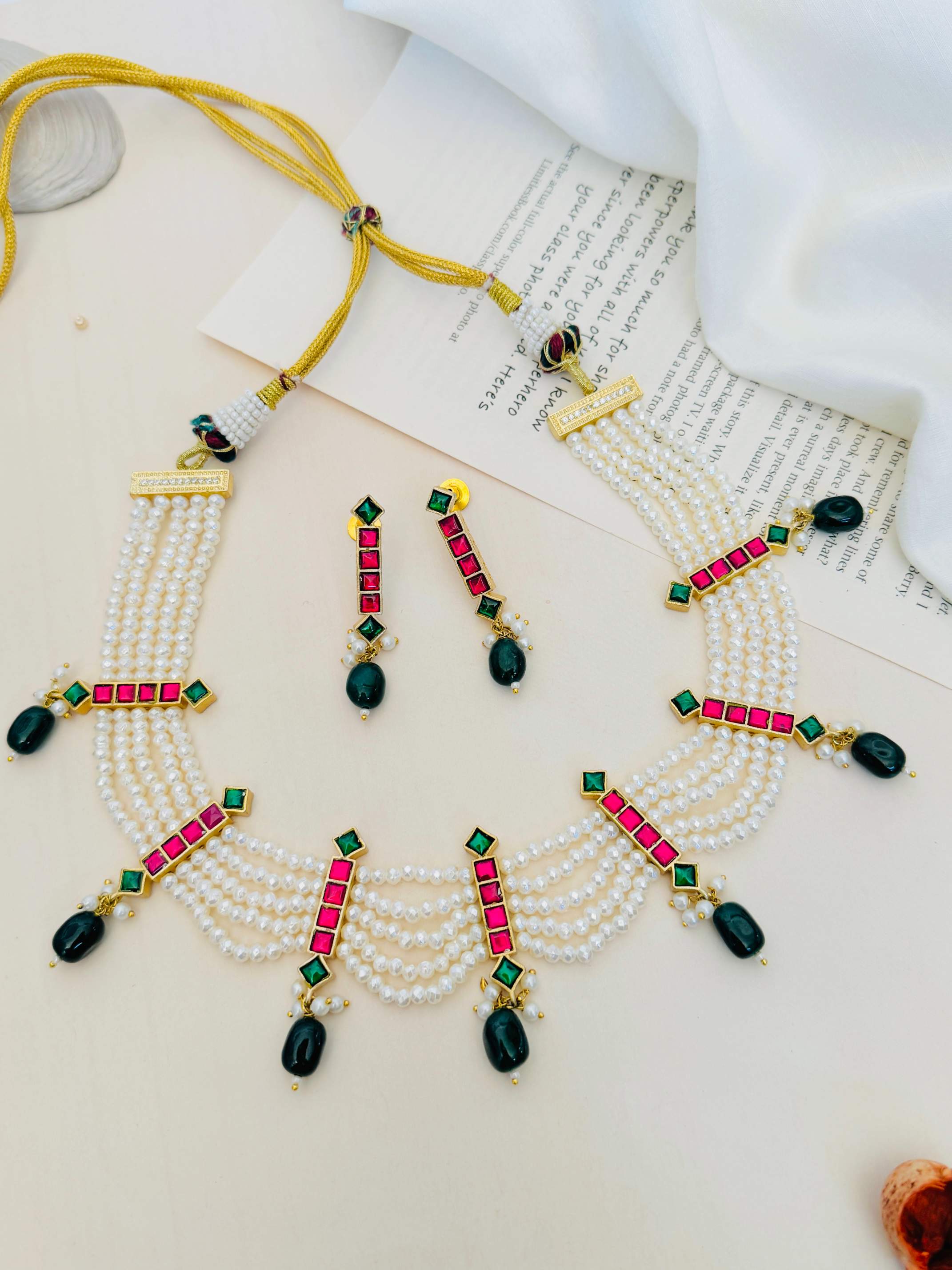 Pearl Choker Diamond Sabyasachi Necklace Set with green and pink accents and matching earrings
