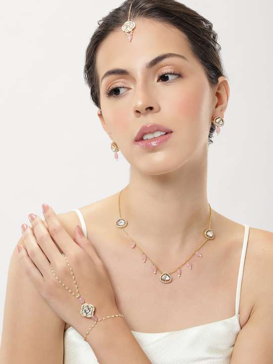 Polki Hand Bracelet Combo by Abdesignsjewellery featuring gold and pink gemstone detailing worn by model