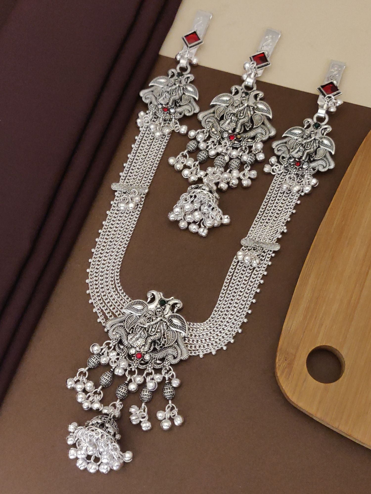 Radha Krishna Style German Silver Plated Long Juda Pin Combo featuring intricate designs and red accents