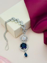 Thumbnail for Round Silver Plated American Diamond Maangtikka featuring a blue stone and intricate silver design