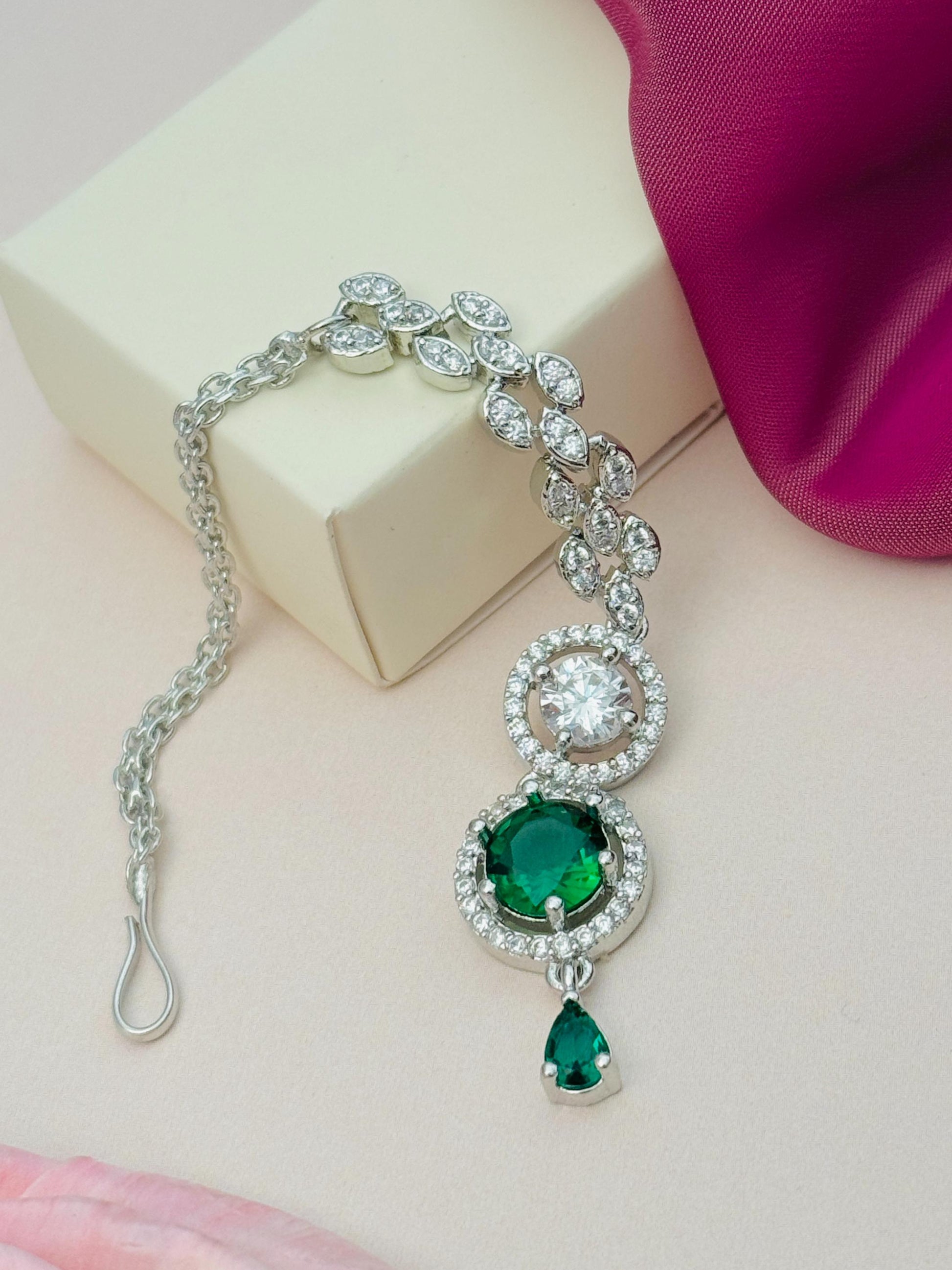 Round Silver Plated American Diamond Maangtikka with green and clear stones by Abdesignsjewellery