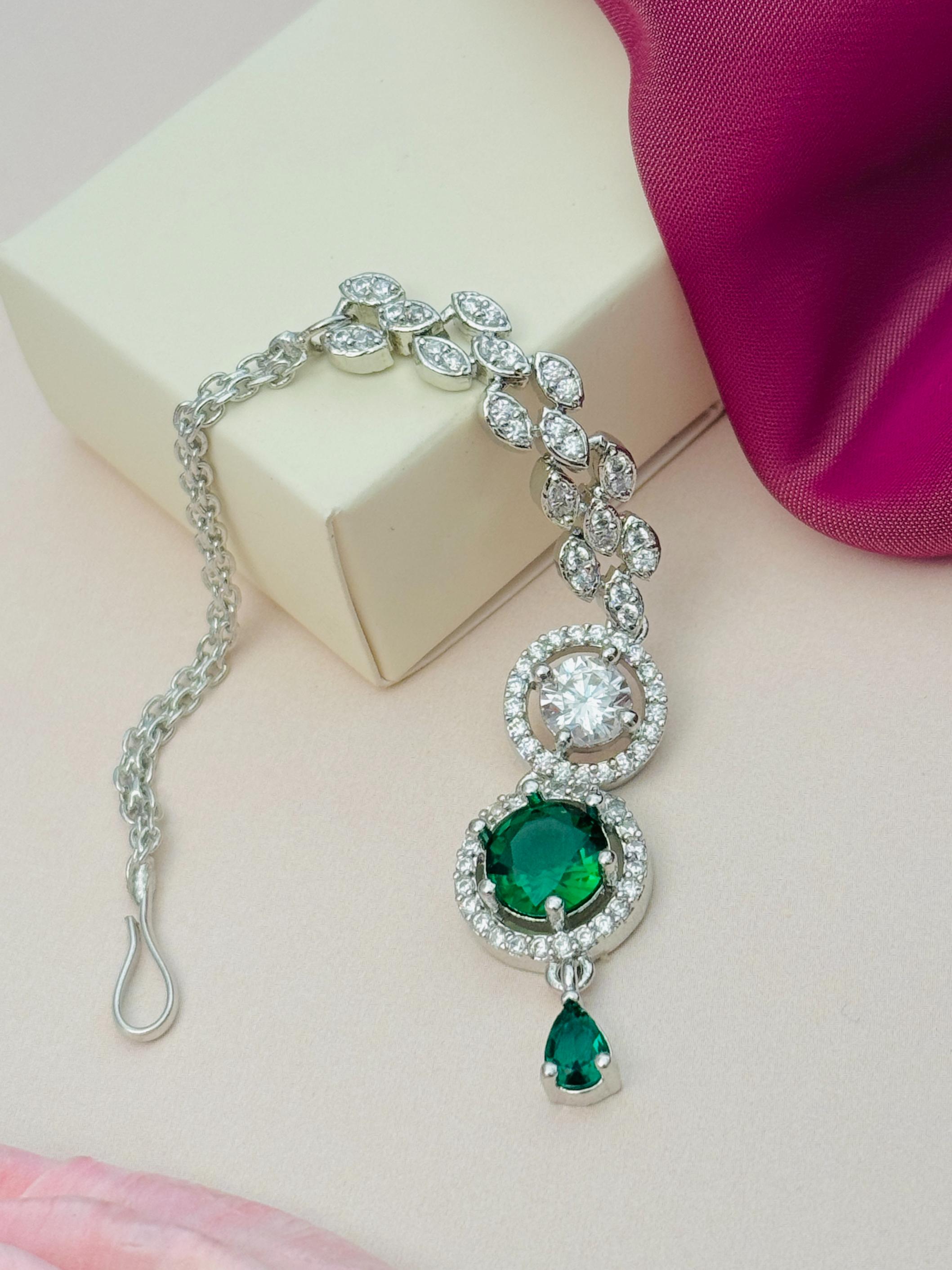 Round Silver Plated American Diamond Maangtikka with green and clear stones by Abdesignsjewellery