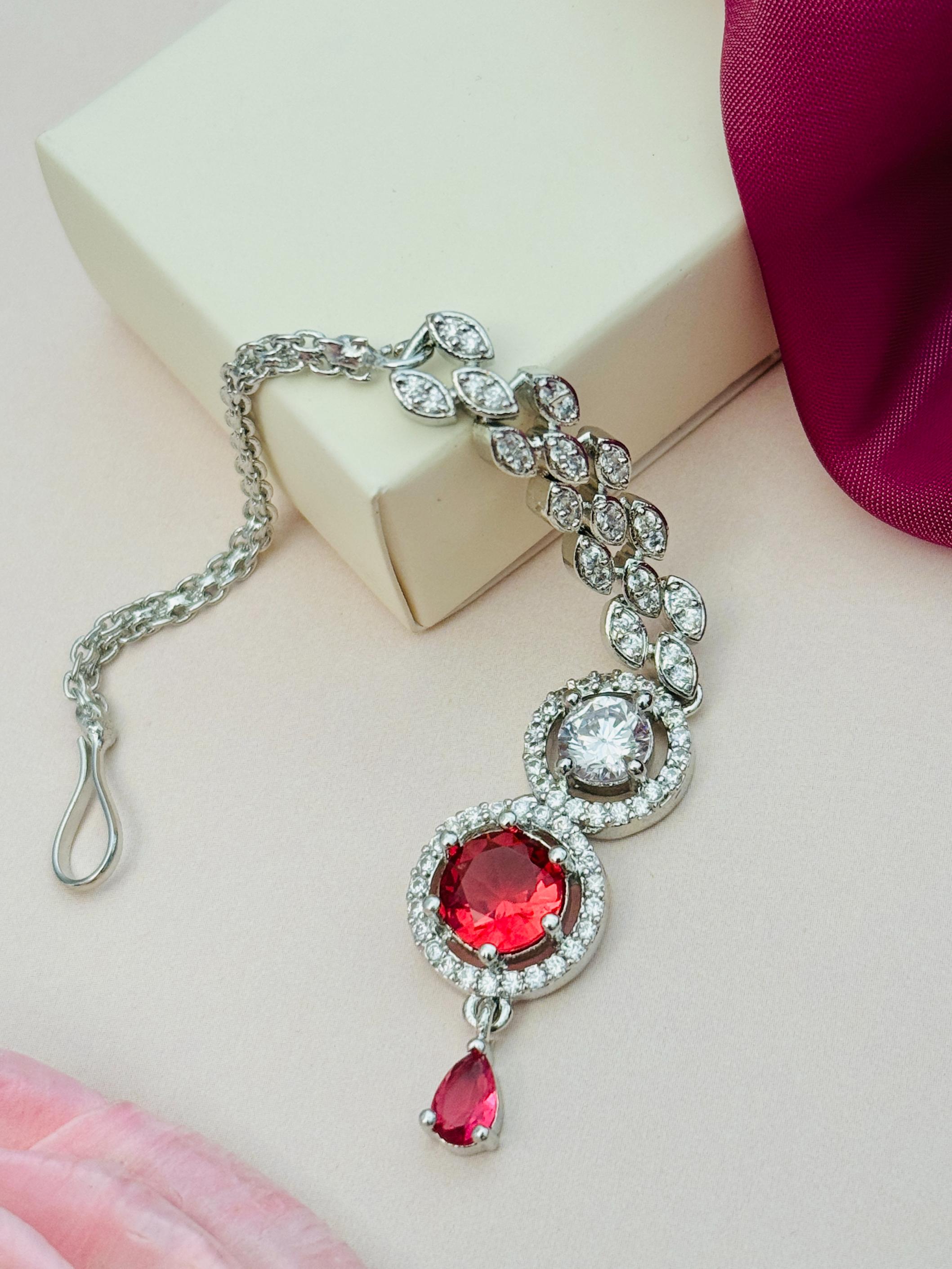 Round Silver Plated American Diamond Maangtikka with red and white stones and intricate silver chain design