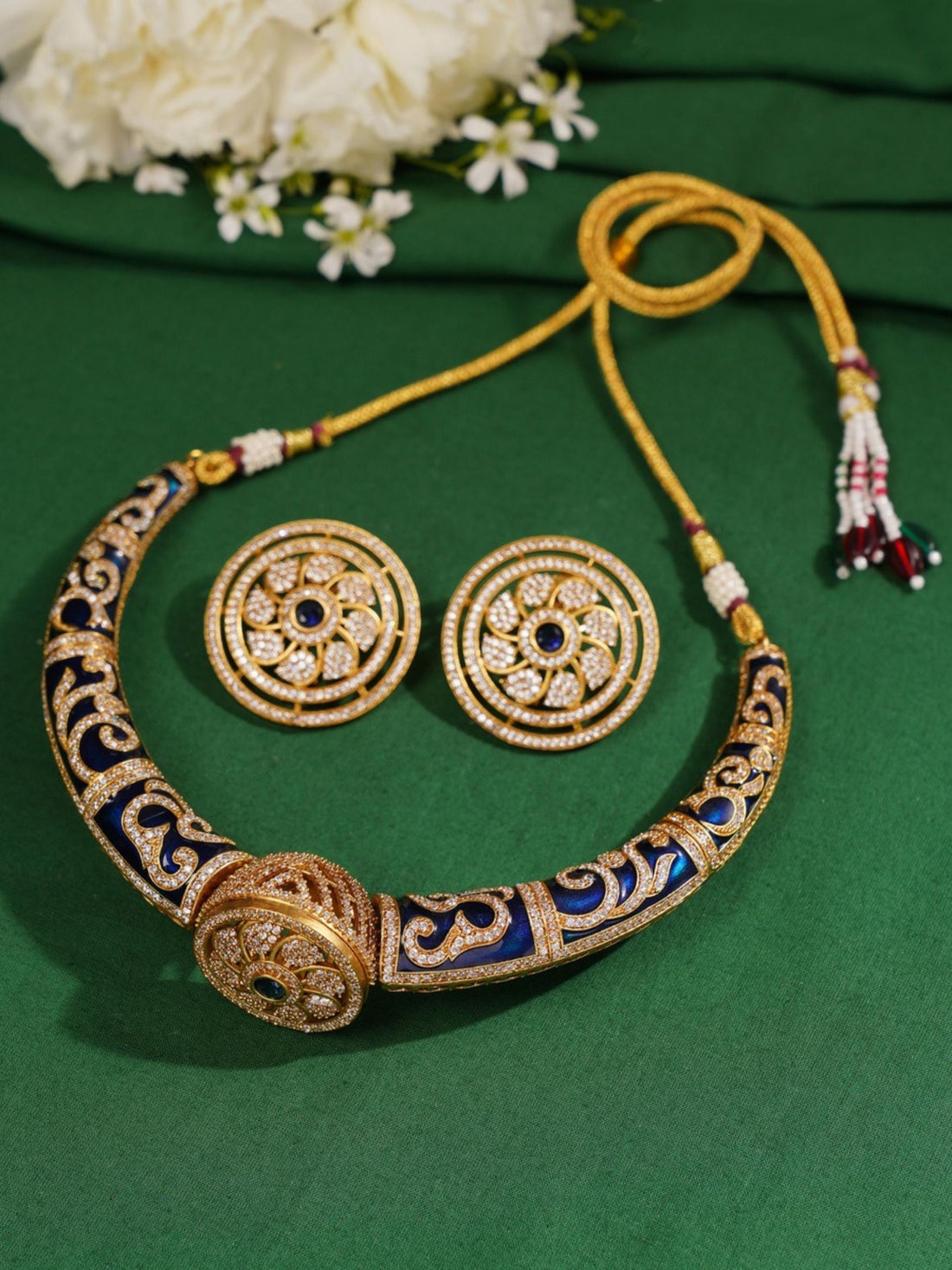 Woman wearing Abdesignsjewellery Royal Blue Meenakari Polki Hasli Necklace Set with matching earrings